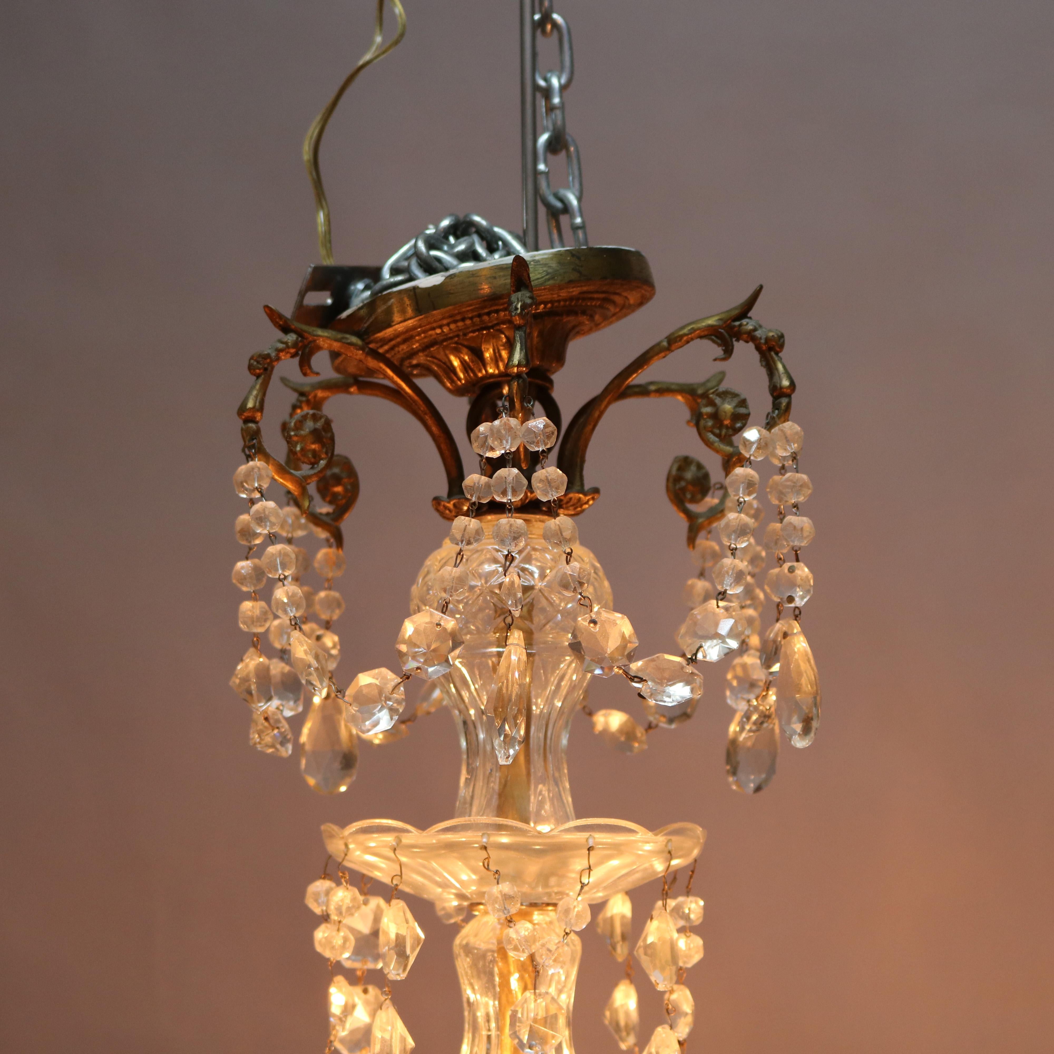 Antique French Bronze and Crystal Twelve-Light Chandelier, circa 1920 10