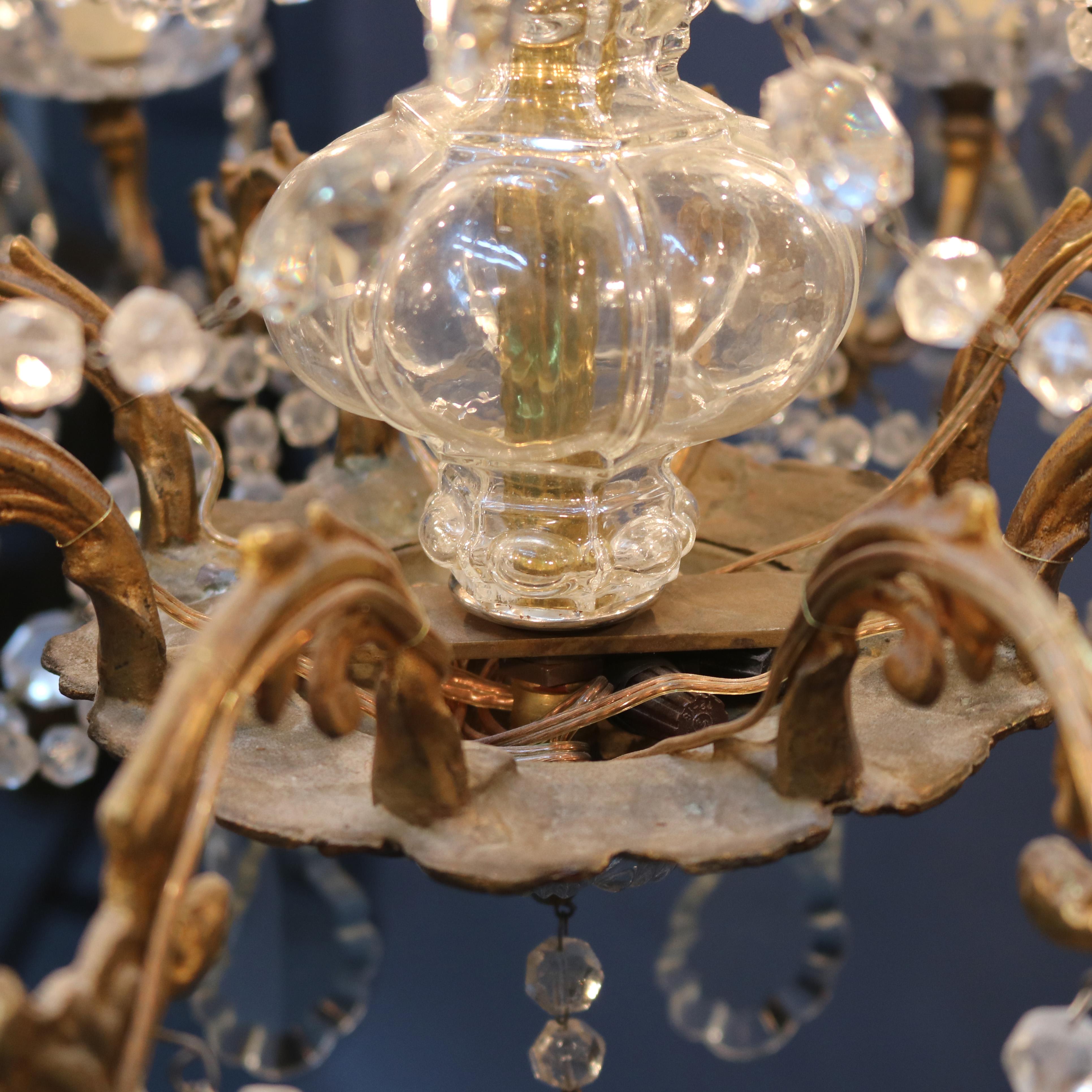 Antique French Bronze and Crystal Twelve-Light Chandelier, circa 1920 11