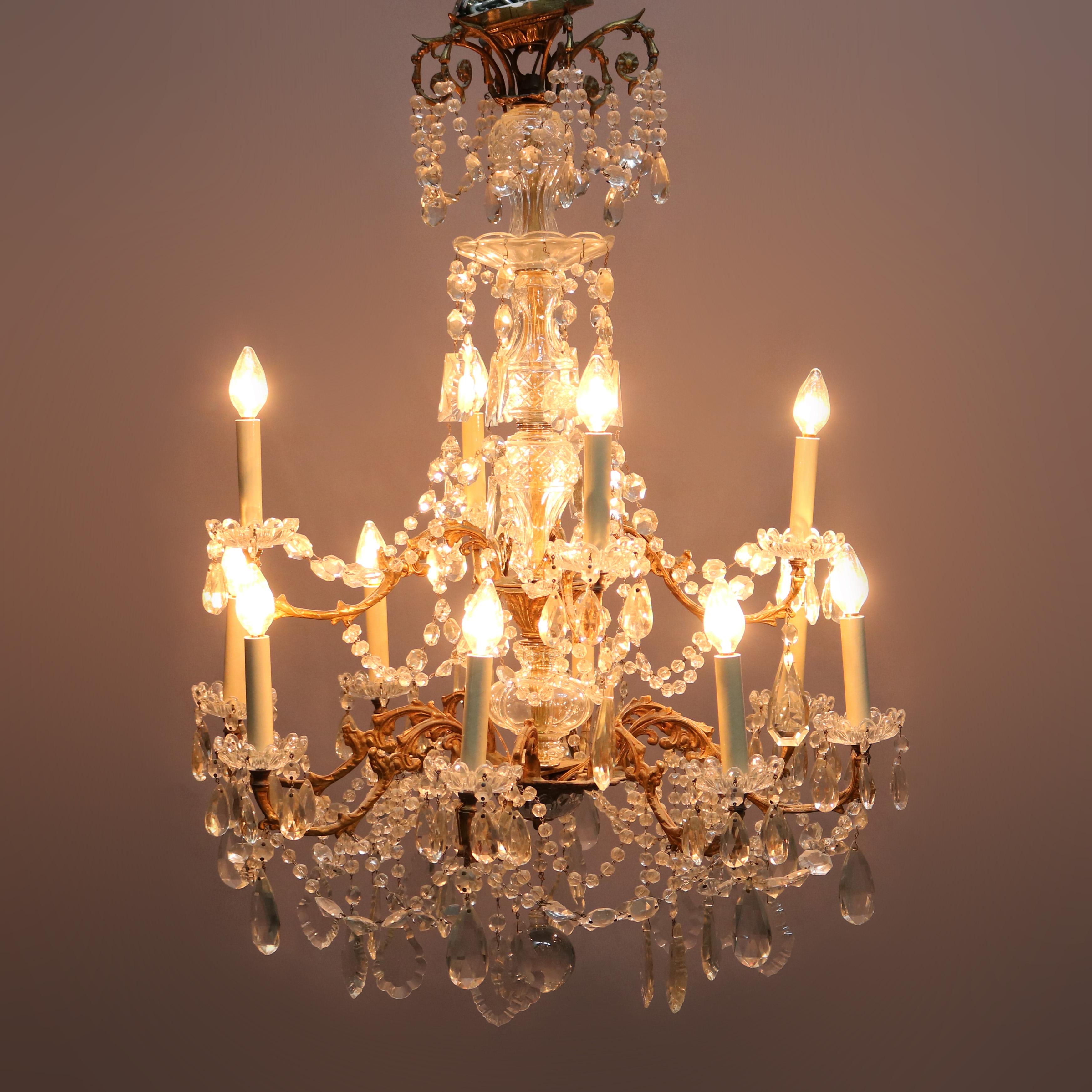 Cast Antique French Bronze and Crystal Twelve-Light Chandelier, circa 1920