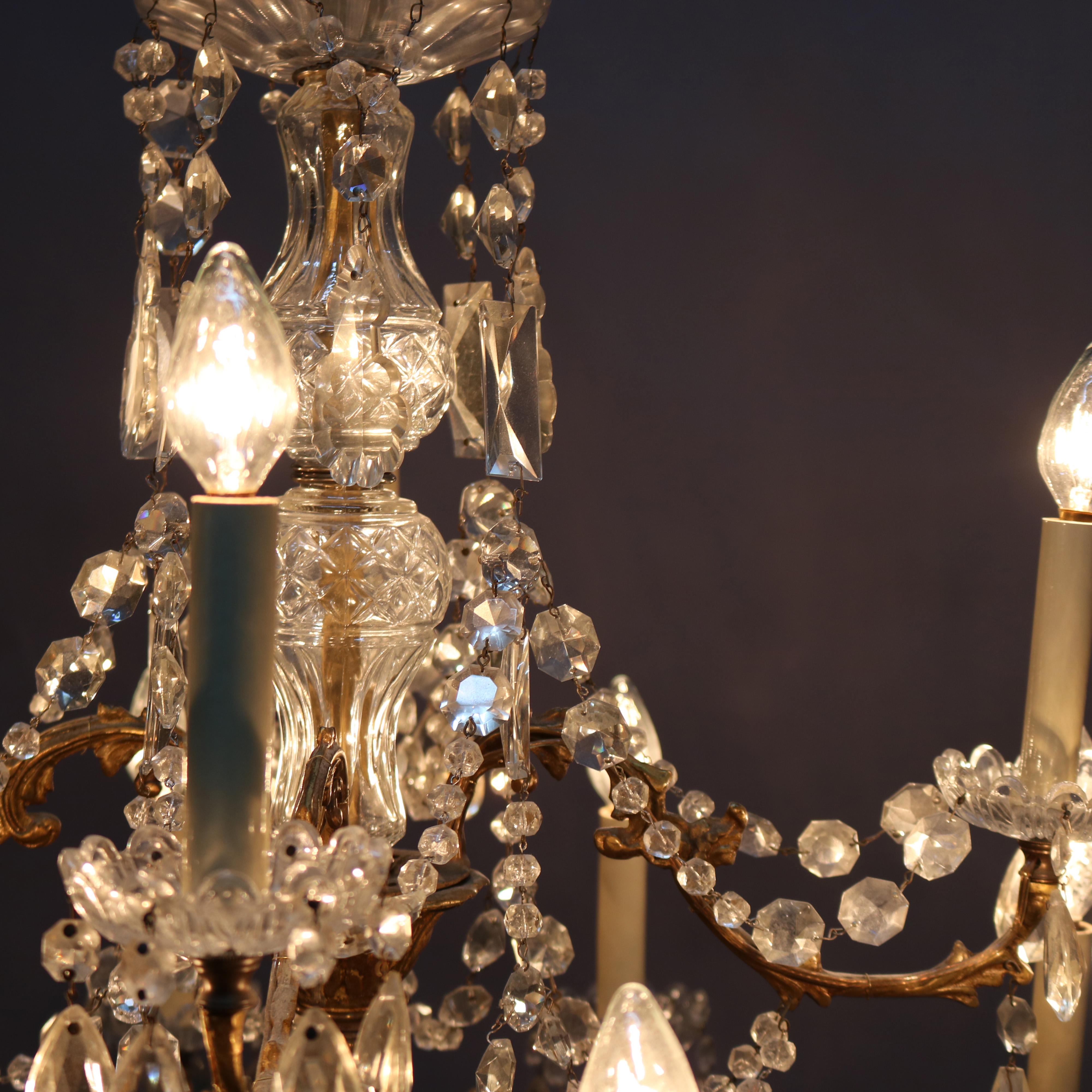 Antique French Bronze and Crystal Twelve-Light Chandelier, circa 1920 4