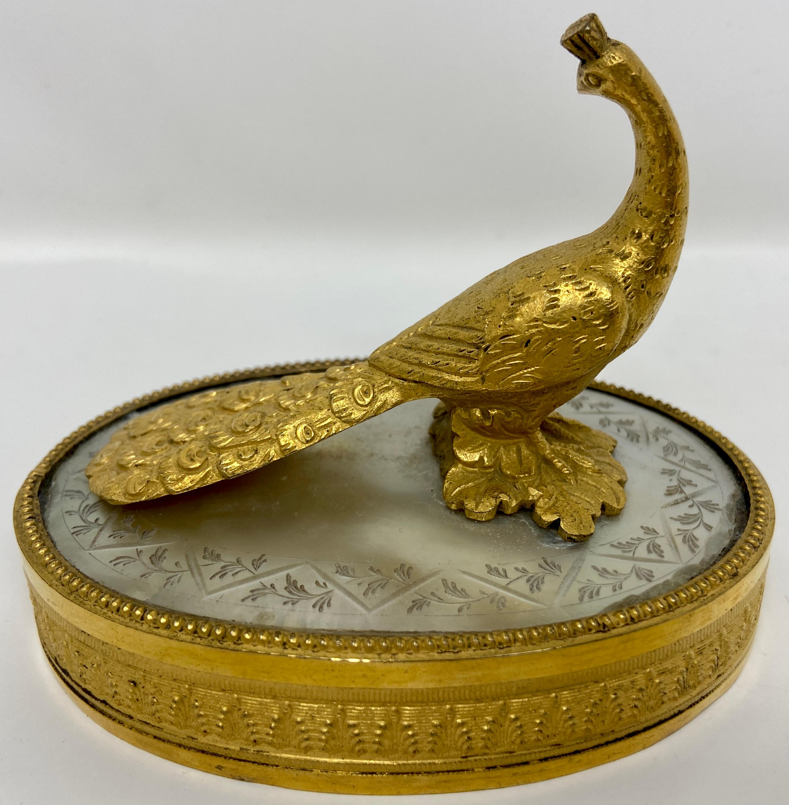 Antique French bronze D' Ore and mother of pearl peacock paper weight, Circa 1900.
