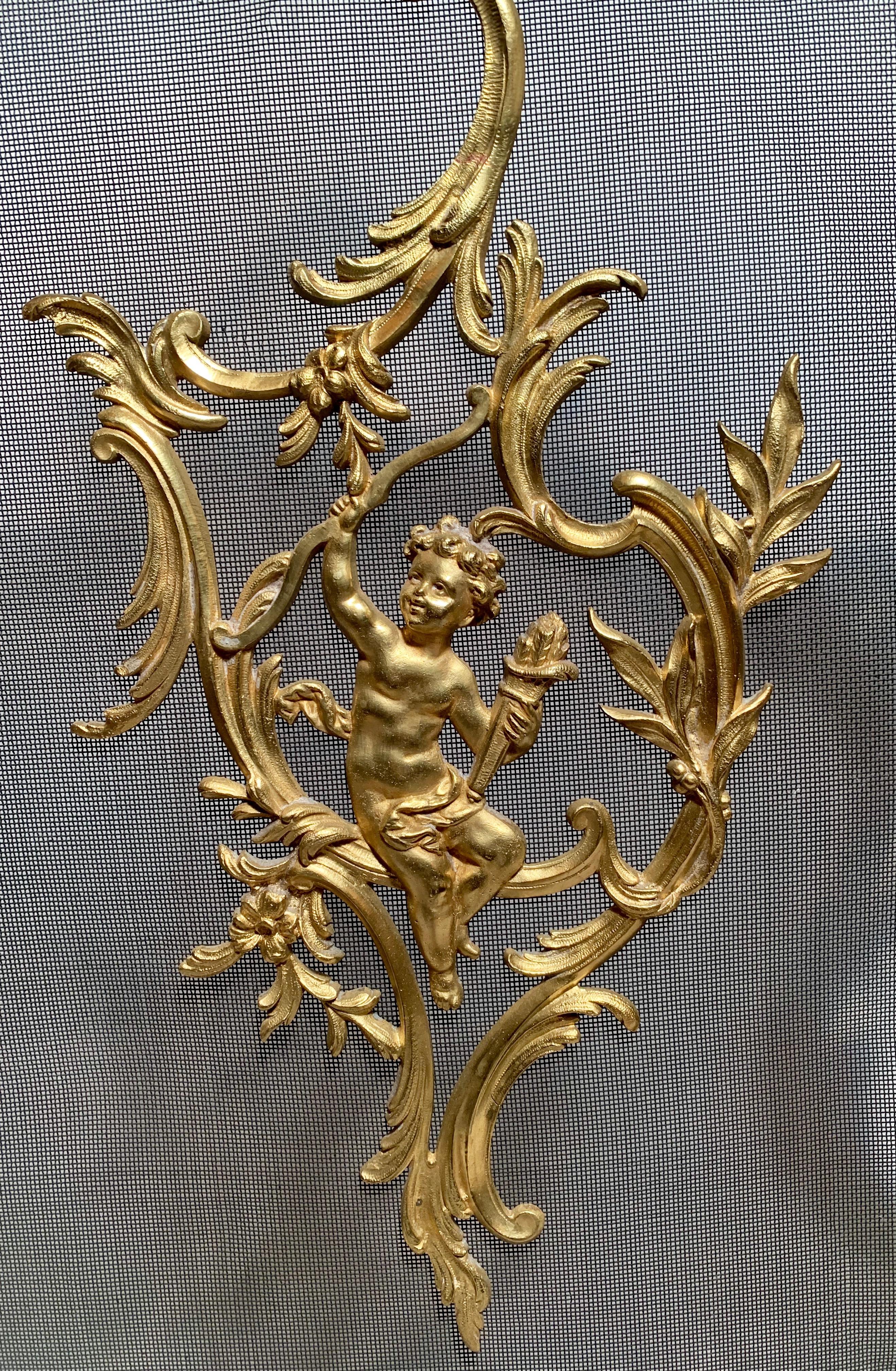 Antique French bronze D'ore fire screen.
  