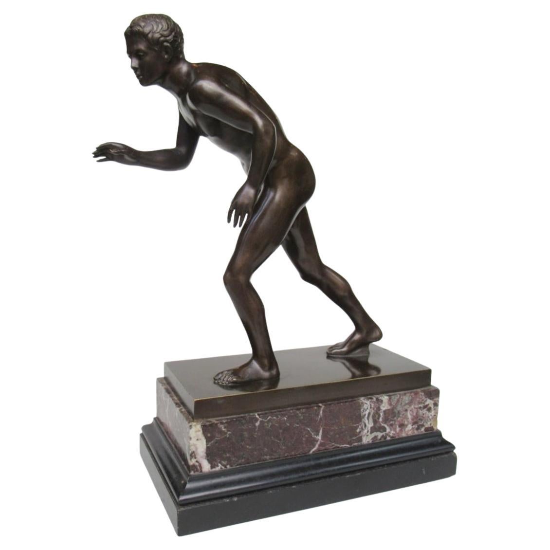 Superb Example of The Borghese Gladiator with well defined muscles and tendons, first half of the Nineteenth Century, complete with its original cream and pink veined brown marble base, ending on a black marble stepped base. 

Condition: Superb