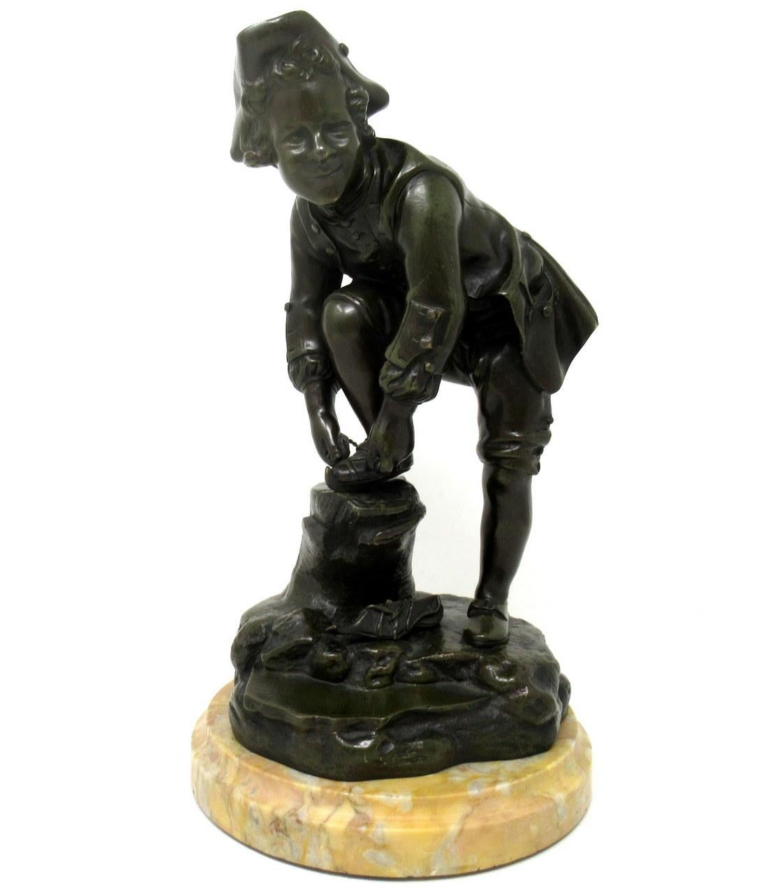 Fine quality well cast dark olive green patinated bronze of a young male Skater of generous size, complete with its original well grained Sienna Marble Circular Stepped Base. 

Third quarter of the Nineteenth century, of French origin, after an