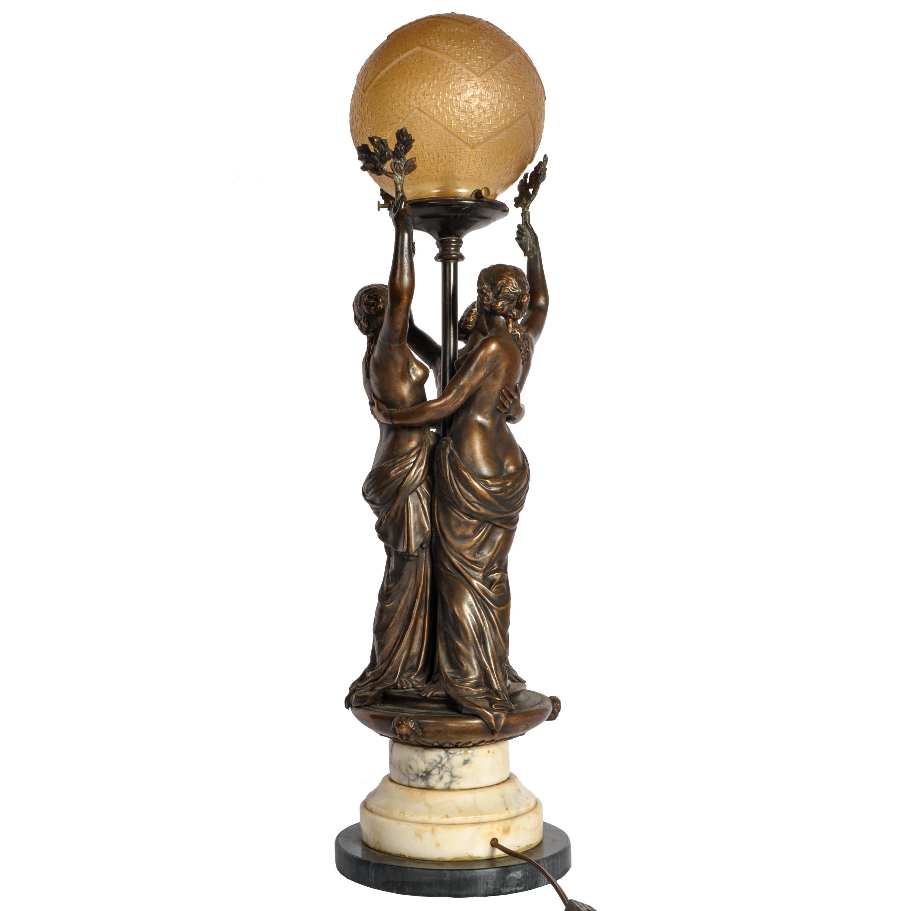 A fine & large antique French bronze statue/sculpture lamp modeled as The Three Graces, Circa 1900.
The lamp is finely modeled and cast in bronze depicting the three Graces from Greek antiquity: Euphrosyne, Aglaia and Thalia, in whom beauty was