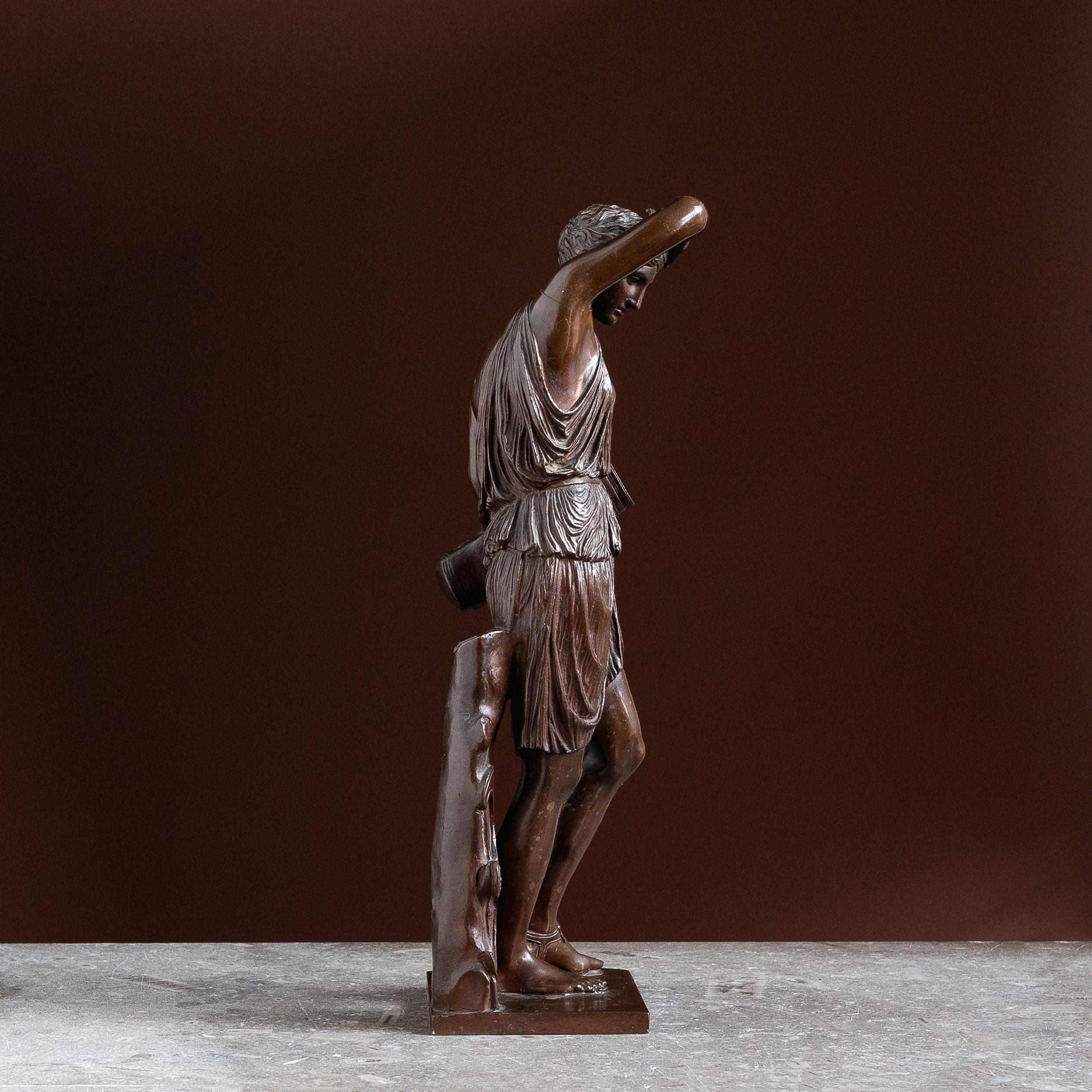An antique French bronze model of the Wounded Amazon by Barbedienne, mid-nineteenth century, with rich brown patina, stamped to the base.

