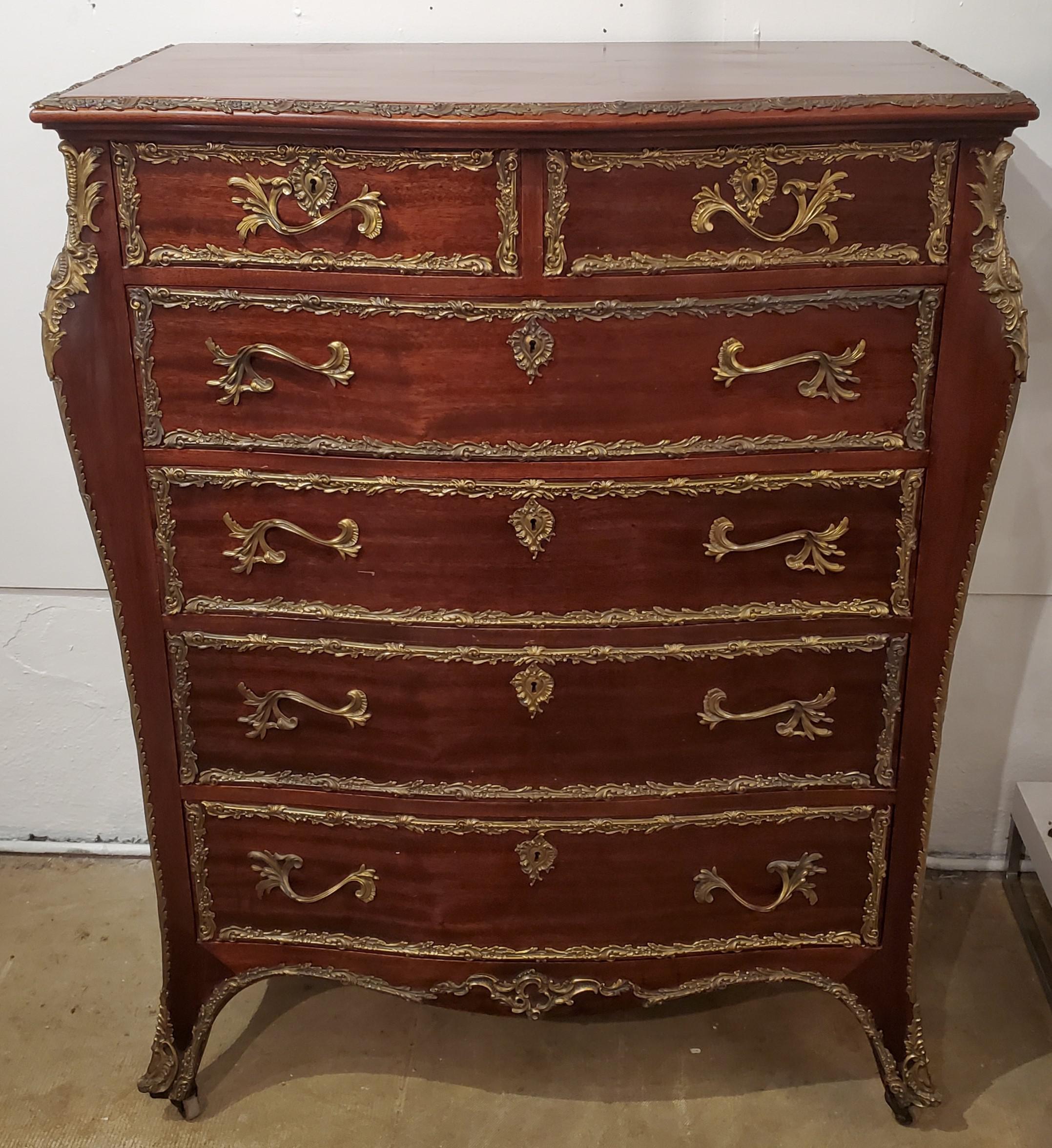 Antique French Bronze ormolu Dresser on Caster with 6 deep drawers. Each drawer has a locking mechanism and comes with keys.