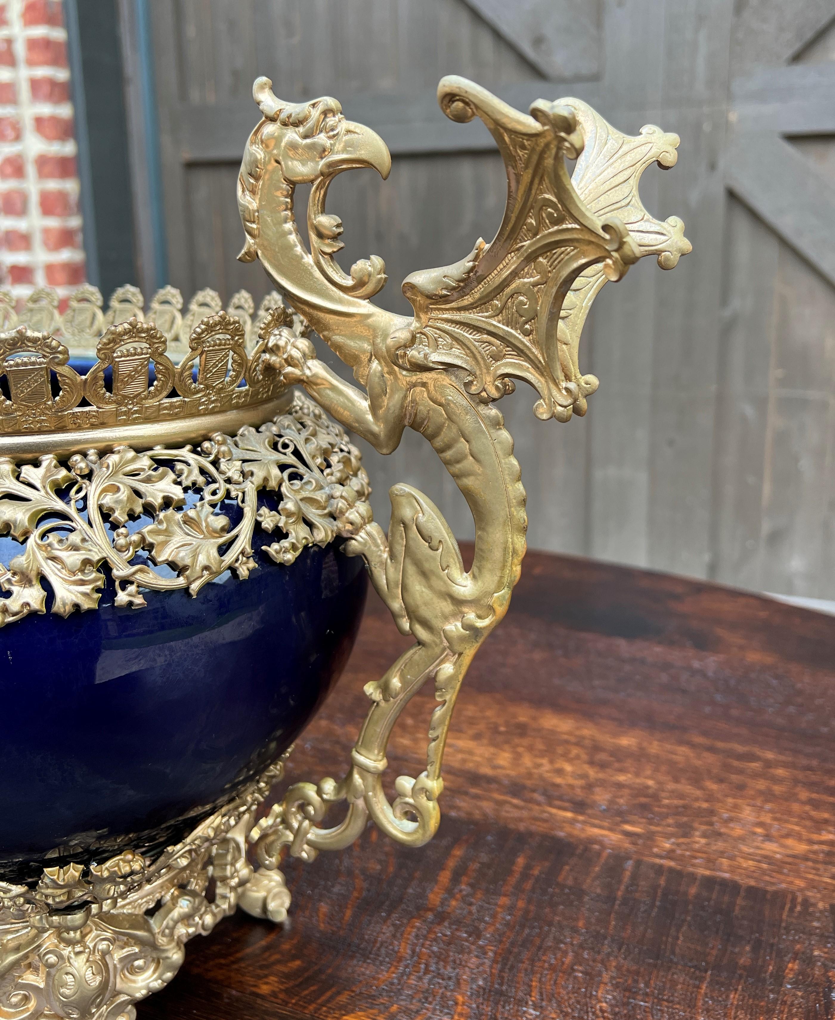 orgeous large blue antique French cache pot, planter, jardiniere, flower pot, vase or bowl~~bronze~~ART NOUVEAU~~c. 1900

Authentic French planter or cache pot~~Art Nouveau era~~vibrant cobalt or indigo blue glaze with bronze accents

Although