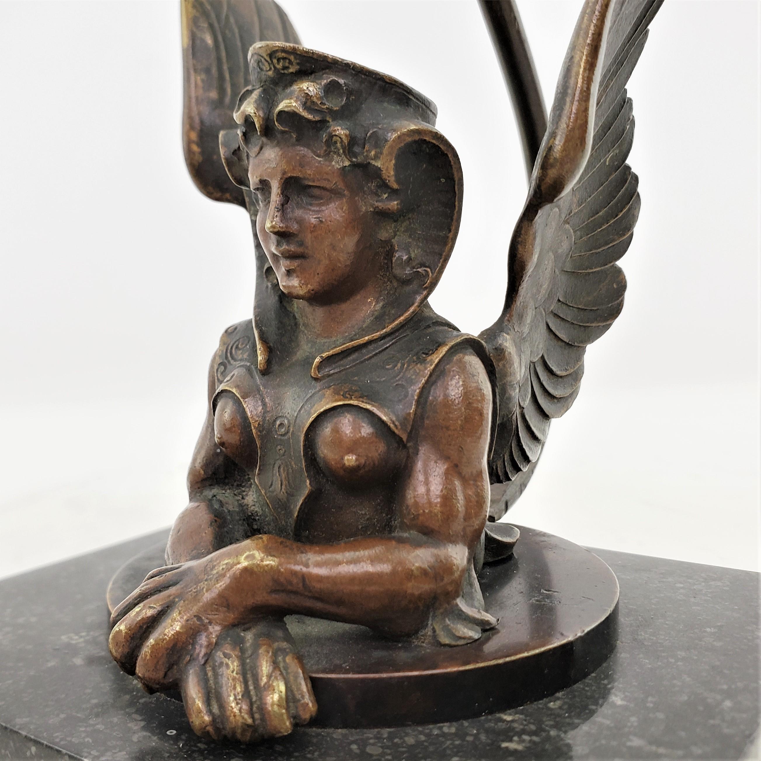 Montre de poche française d'antiquités en bronze et marbre poli de style néo-égyptien en vente 2