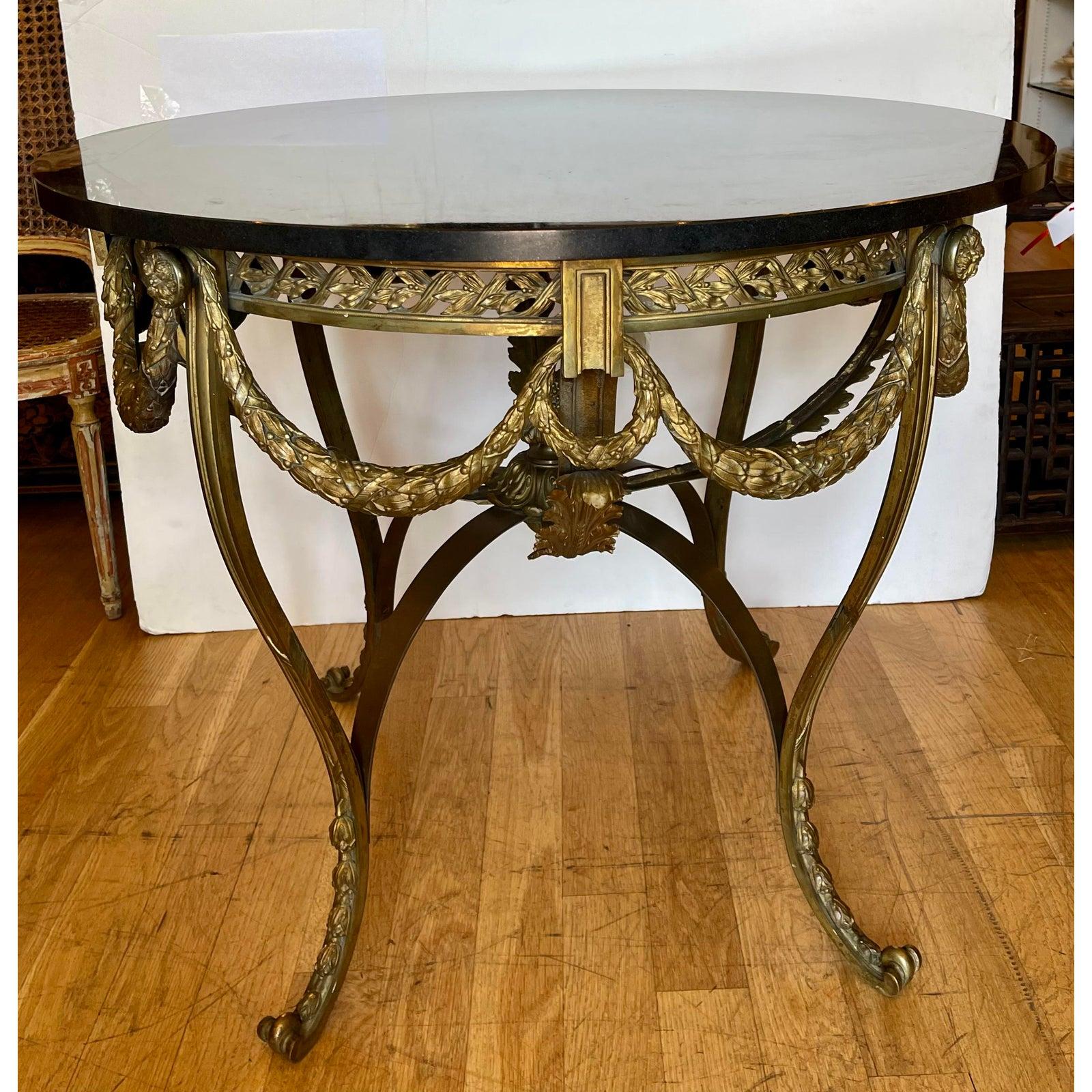Antique French bronze Regency black marble top table.