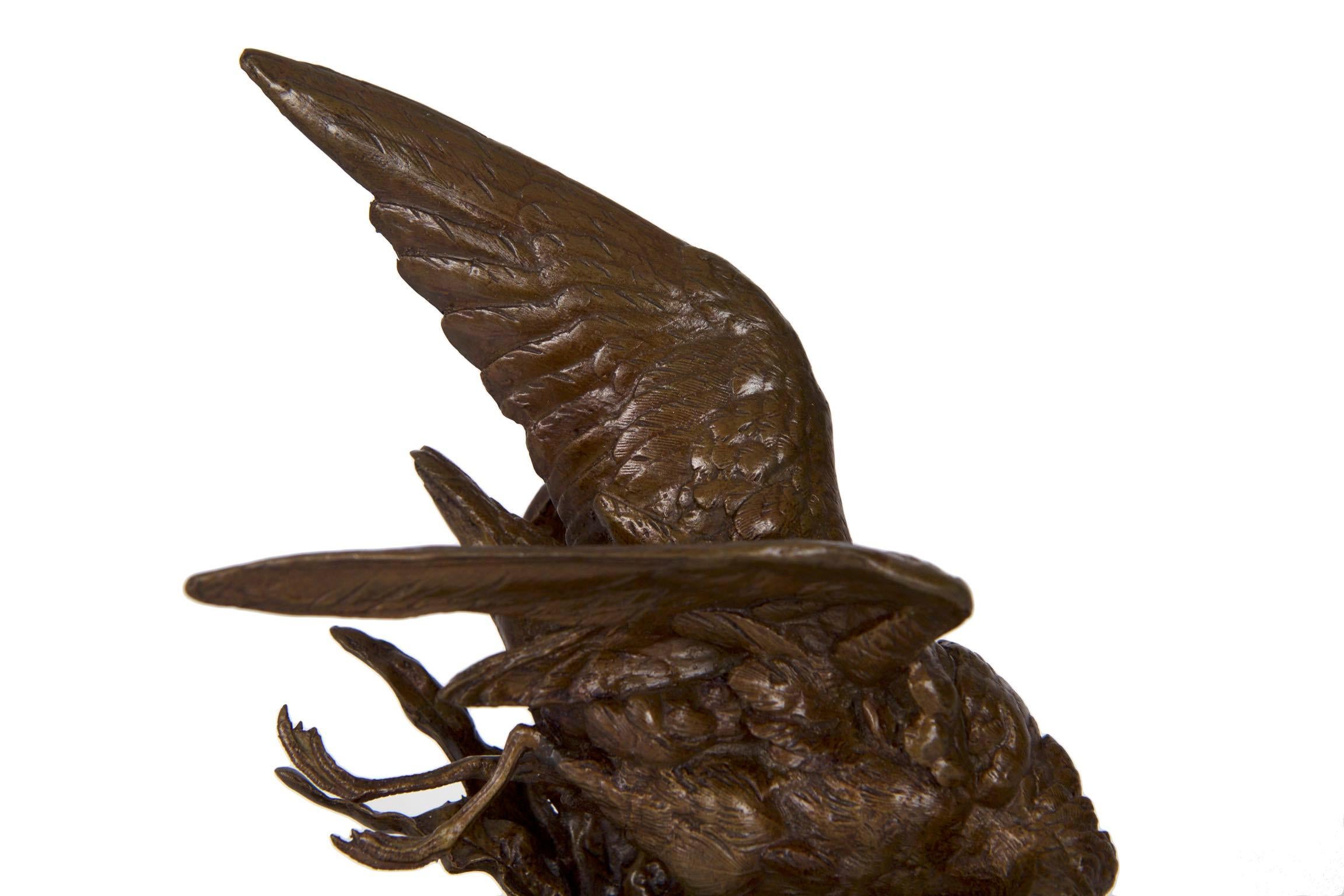 Exquisitely chiseled and cast, as is almost always the case with lifetime works by Moigniez, this fine cabinet bronze is full of life and motion. As the sandpiper flies over a variety of foliage along the water’s edge, his attention is caught by a