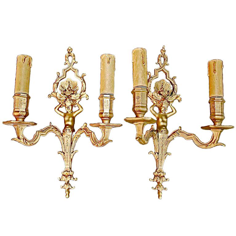 Beautiful Pair of   French bronze Cherubs  sconces For Sale