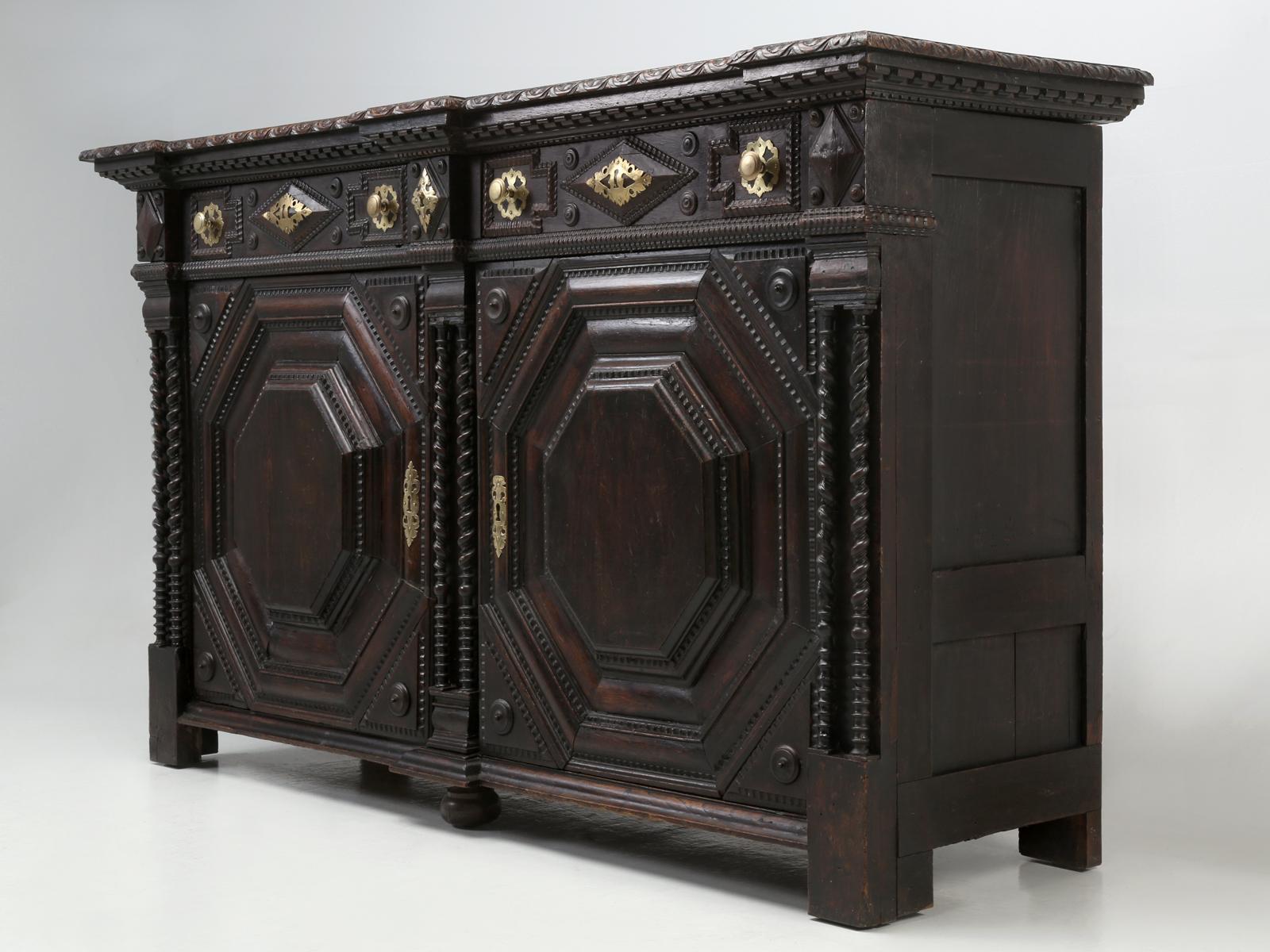 Exquisite antique French Buffet from the St-Malo, Malouin region of France and what makes this French Buffet so special and so unusual, besides the obvious, it’s incredible visual impact, is that whomever originally built this French Buffet,