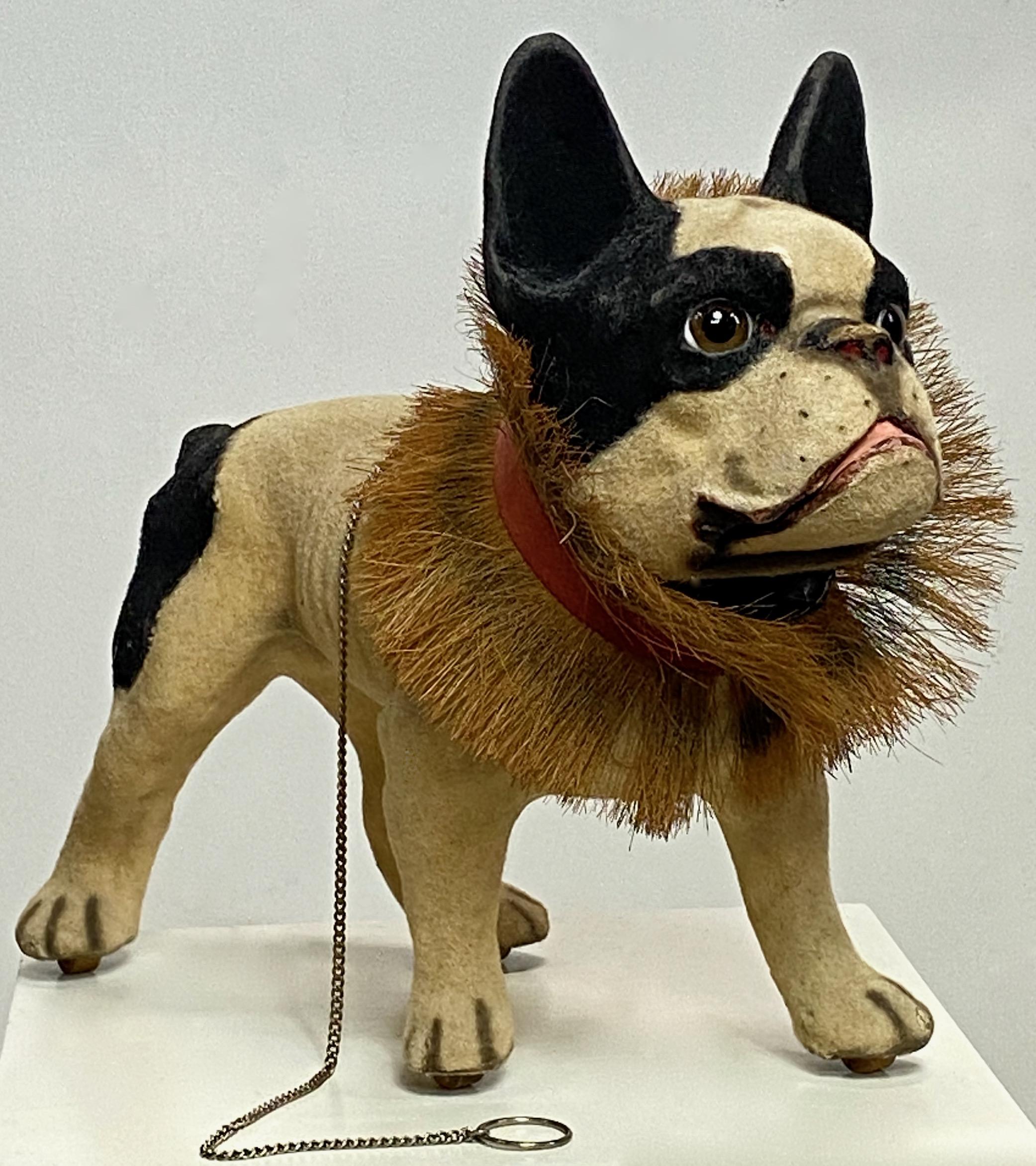 This charming original 19th century French Bulldog is a papier mache pull toy with a nodding head and a small pull chain to enable the barking.
In remarkable well cared for condition, having very minor signs of use and age.