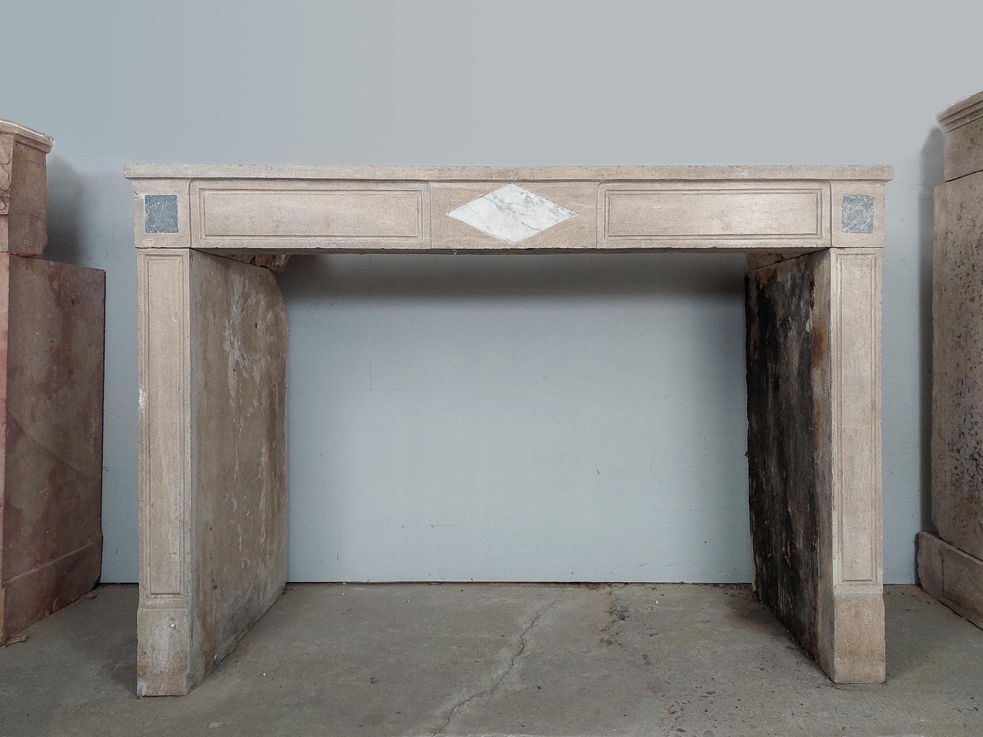 19th Century Antique French Burgundian Stone Fireplace with Marble Inlays For Sale