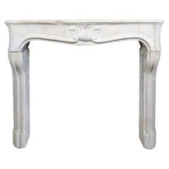 Antique French Burgundy Limestone Mantel