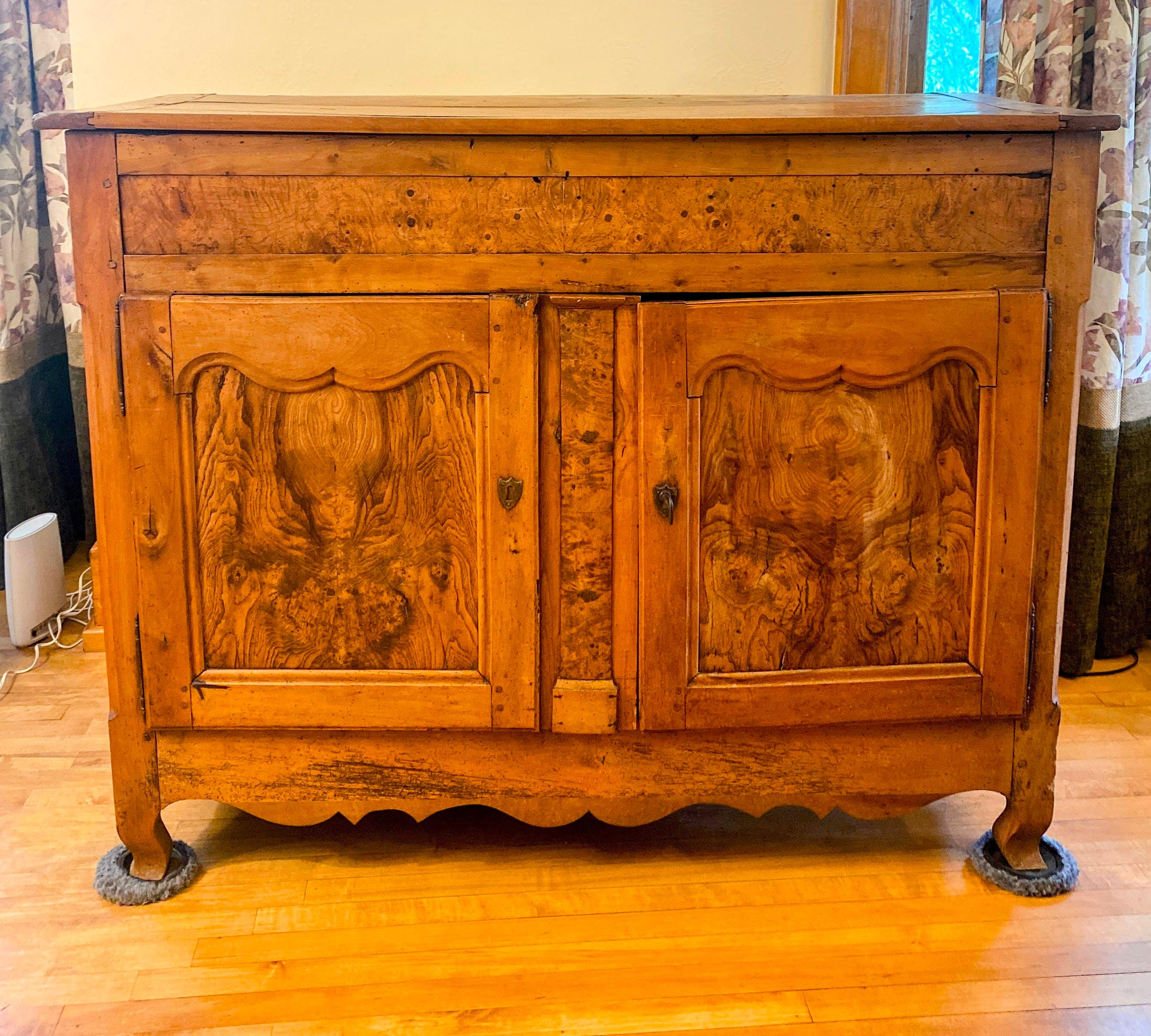 Antique French Tall Blanket Chest Buffet. Buffet is made of fruitwood (pear and apple wood), C. 1800s,  The top opens to reveal the storage trunk compartment. Also features 2 doors in front. One door has a fixed lock. Wooden peg construction (see