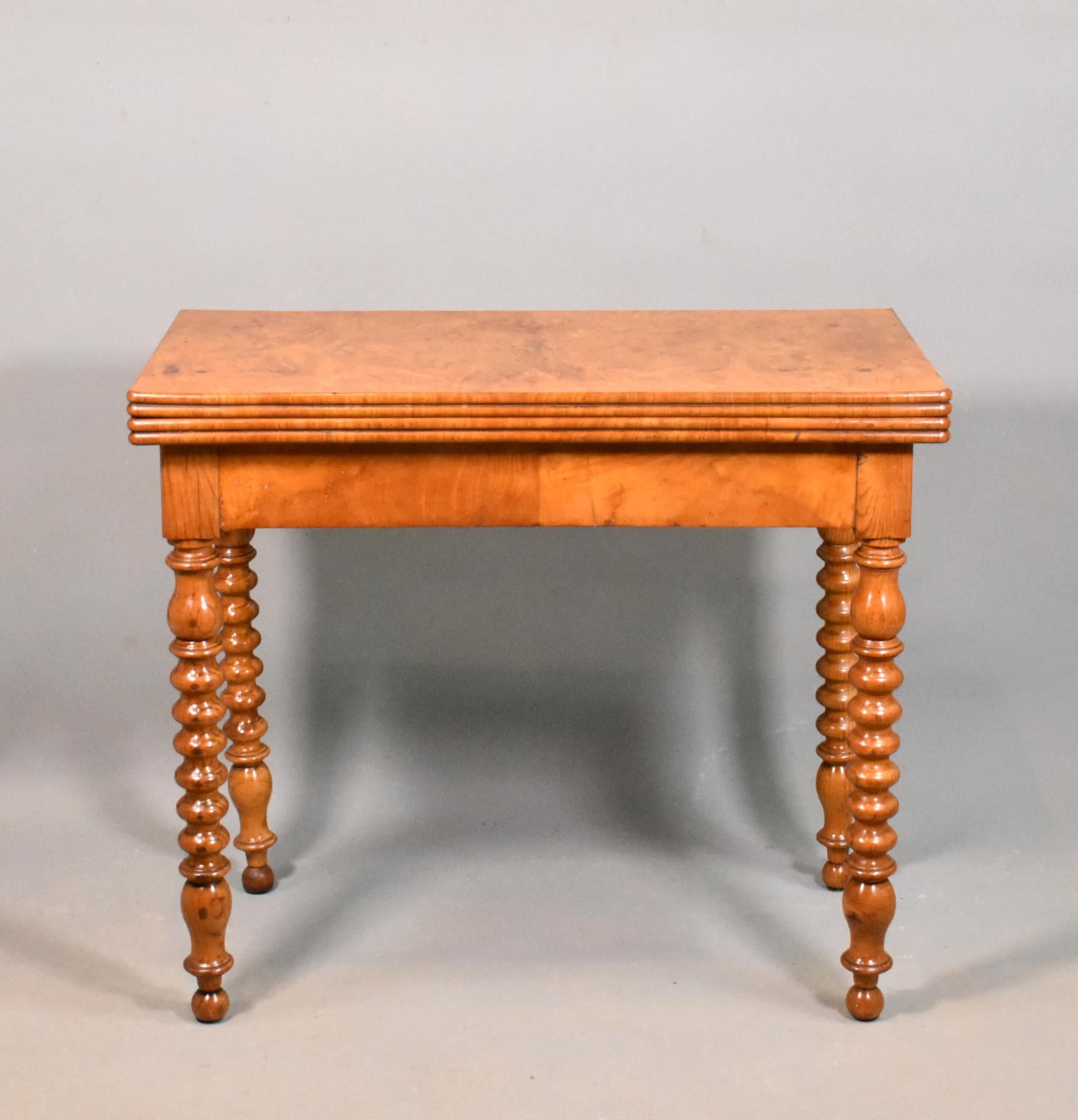 Antique French burr elm folding games table 19th century. 

This beautifully figured burr elm games table features quarter-matched burr elm veneer panels to the top and underside playing surface. 

It has a beaded moulded outer edge with a