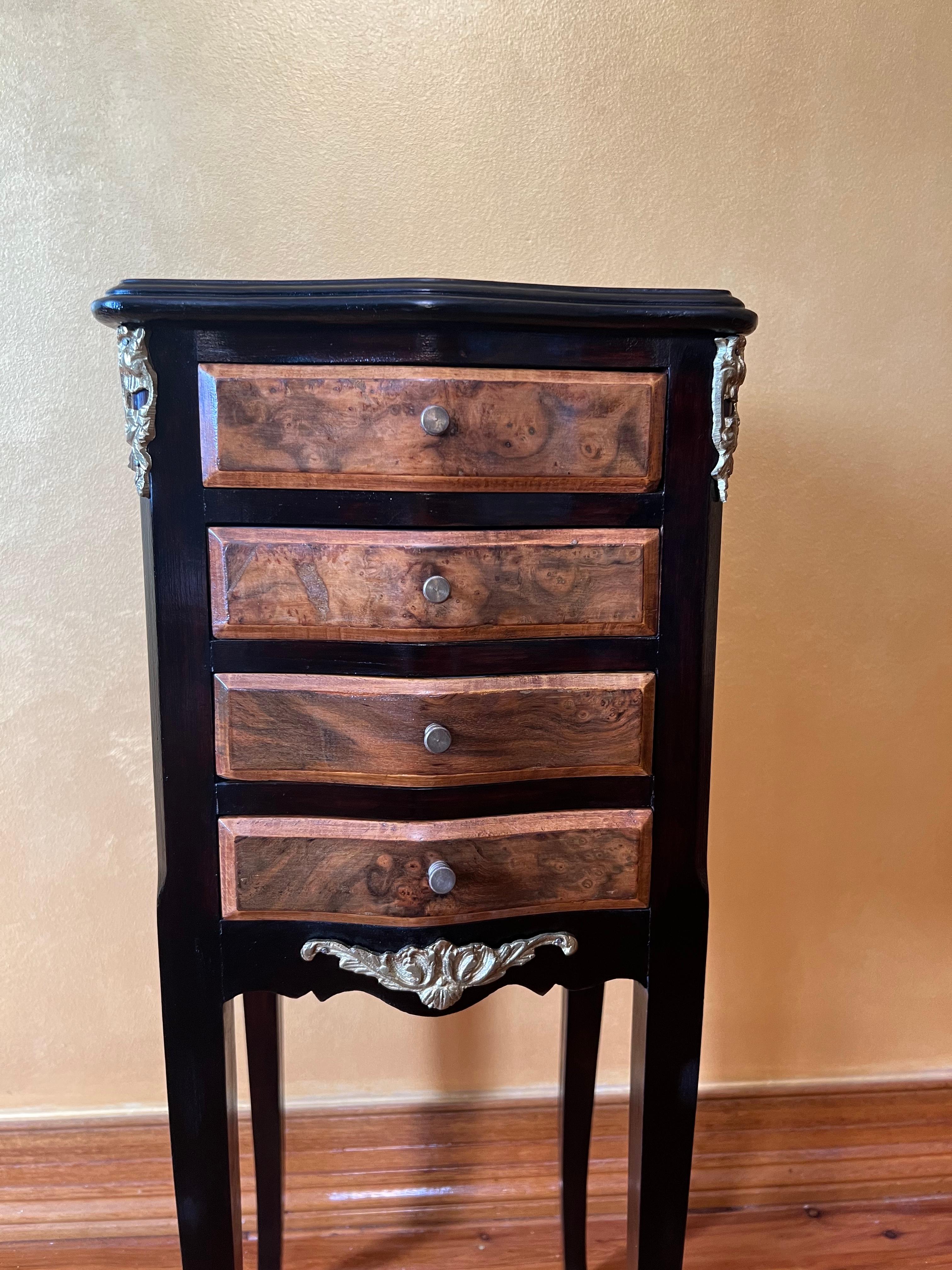 Burr wood on all four drawers, top and both sides, brass details on chest and legs

Circa: Early 20th Century

Material: Walnut Burr

Country Of Origin: France

Measurements: 75cm high, 26cm width, 30cm length

Pick Up Location at: 64 Kalang Road,