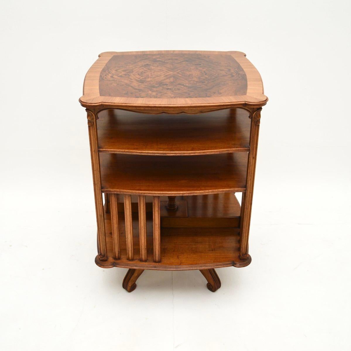 A stunning antique French burr walnut revolving bookcase. This was made in France, it dates from the 1900-1910 period.

The quality is outstanding, this is beautifully made and has stunning burr walnut grain patterns on the top, with cross banded