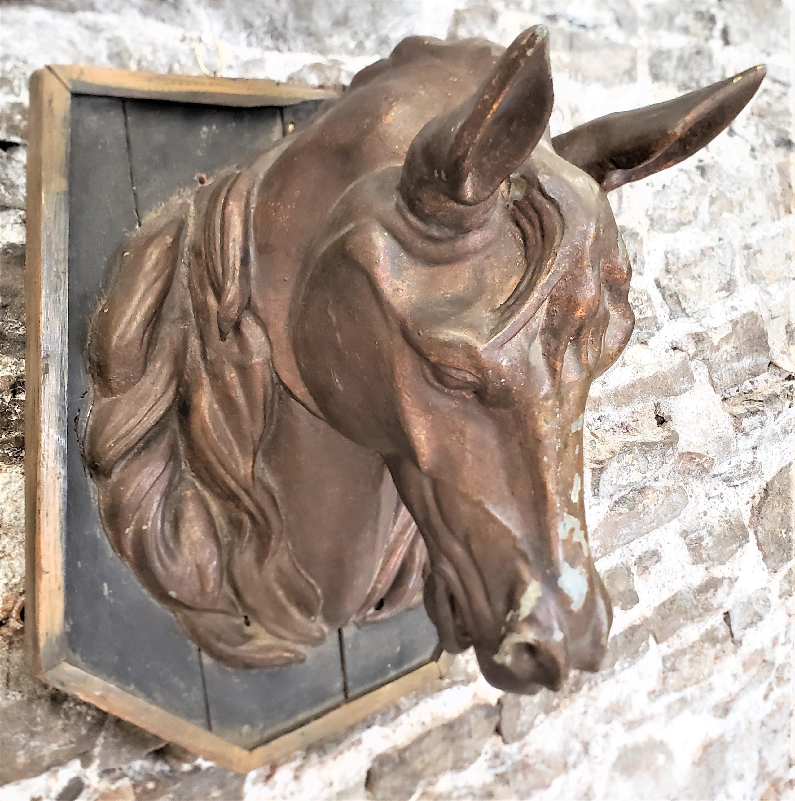 This antique butcher shop horse meat advertising sign, or Boucherie Chevaline' has no maker's marks, but presumed to have originated from France and dating to approximately 1880 and done in the period Victorian style. The ornately cast horses head