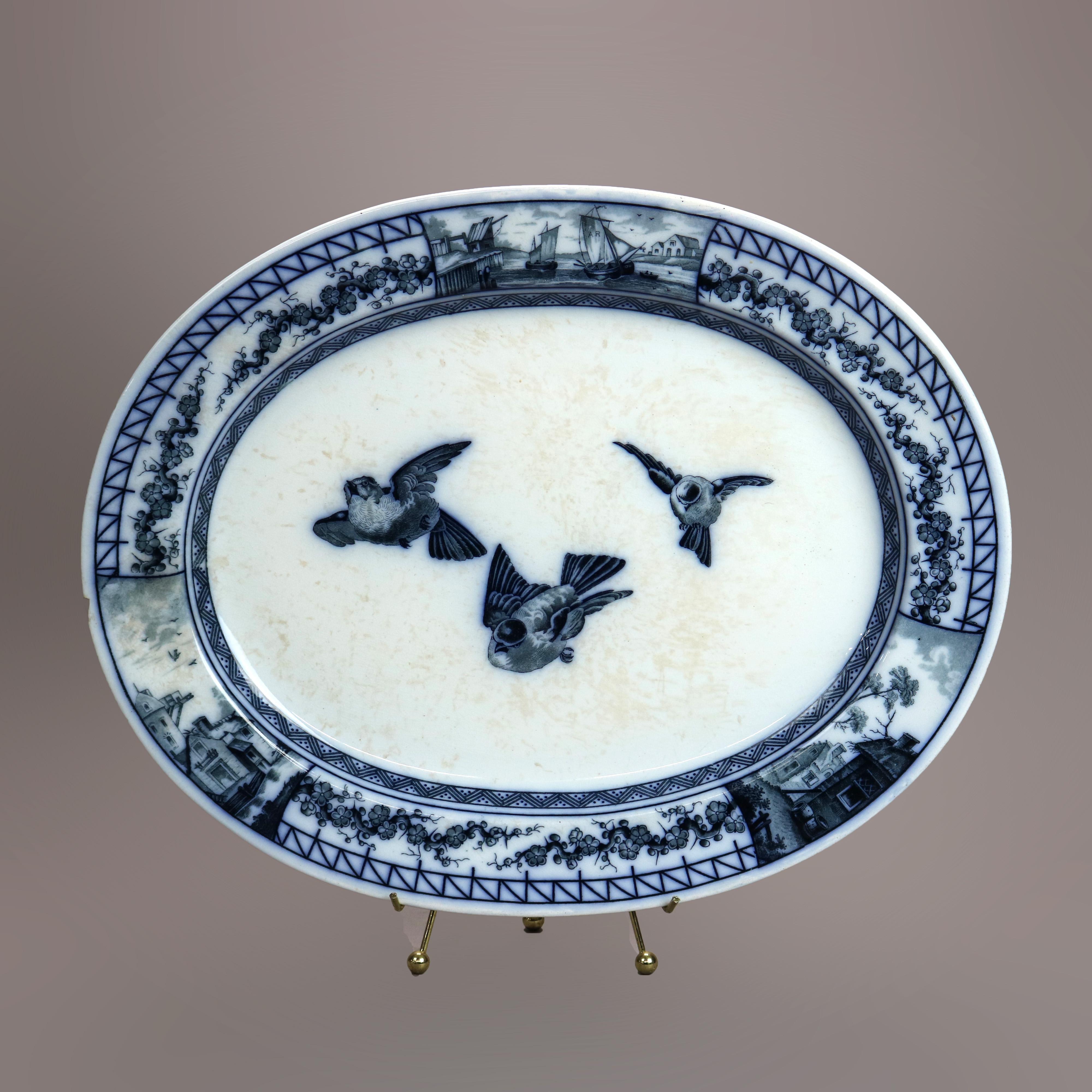 An antique French platter attributed to BWM & Co. offers glazed pottery construction with well having birds in flight with surround having reserves including maritime seascape and windmill scenes, maker mark en verso as photographed, reminiscent of