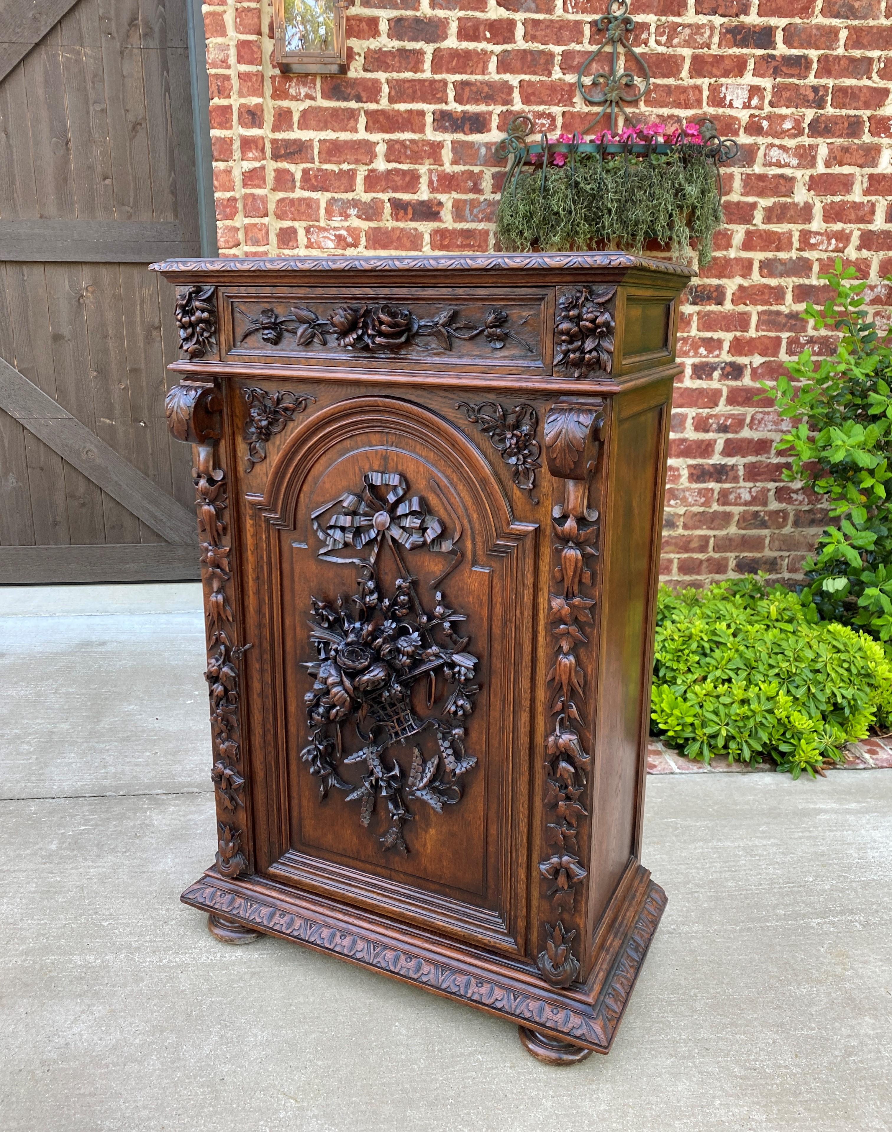 Antique French Cabinet Chest Bookcase Carved Oak Renaissance Revival Roses Tall In Good Condition In Tyler, TX