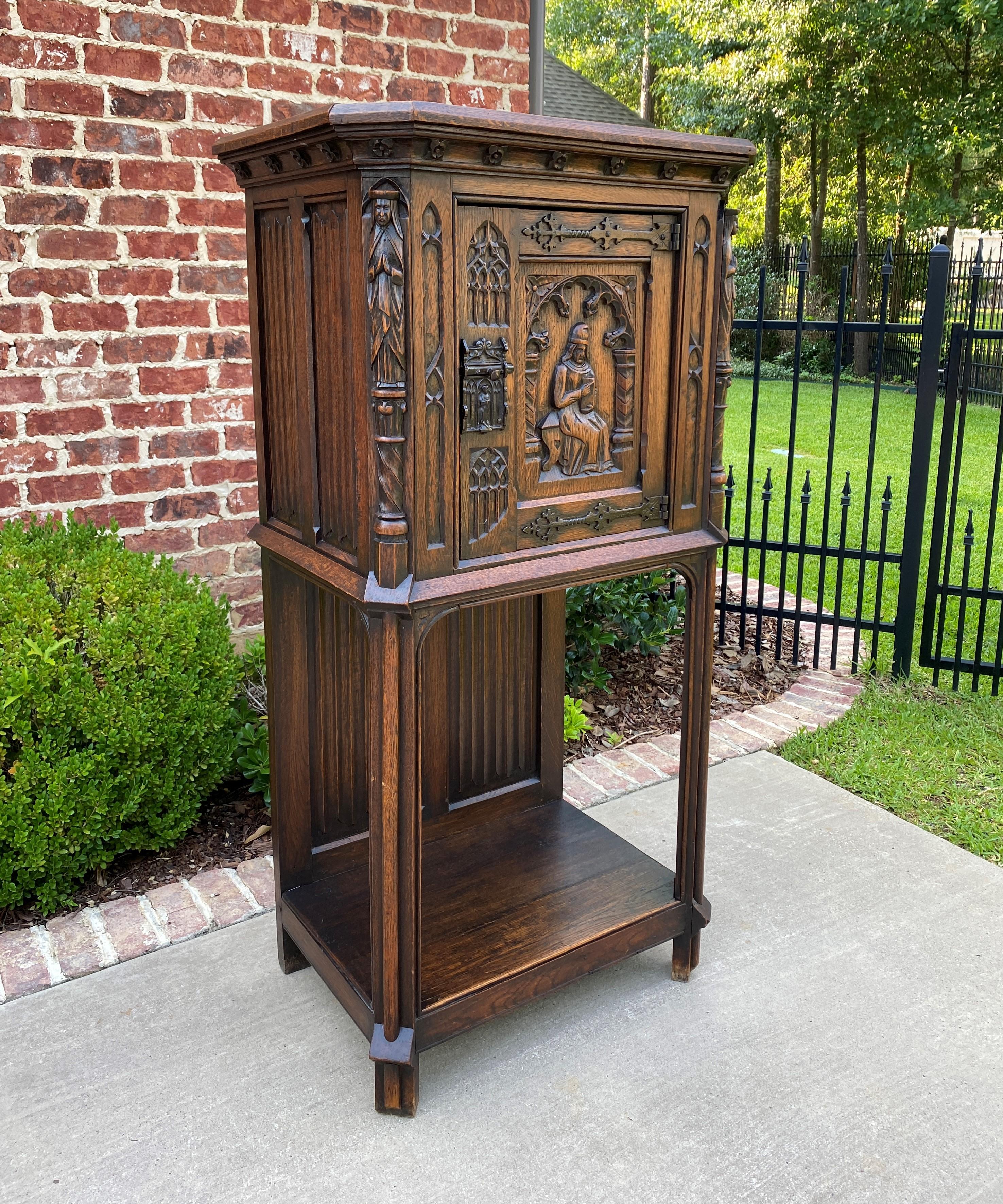 Antique French Carved Oak Gothic Sacristy Vestry Altar Wine bar cabinet~~c. 1880s 

In 18th and 19th century Europe, sacristy or vestment cabinets were used to store liturgical garments, robes, wine and other articles associated primarily with the