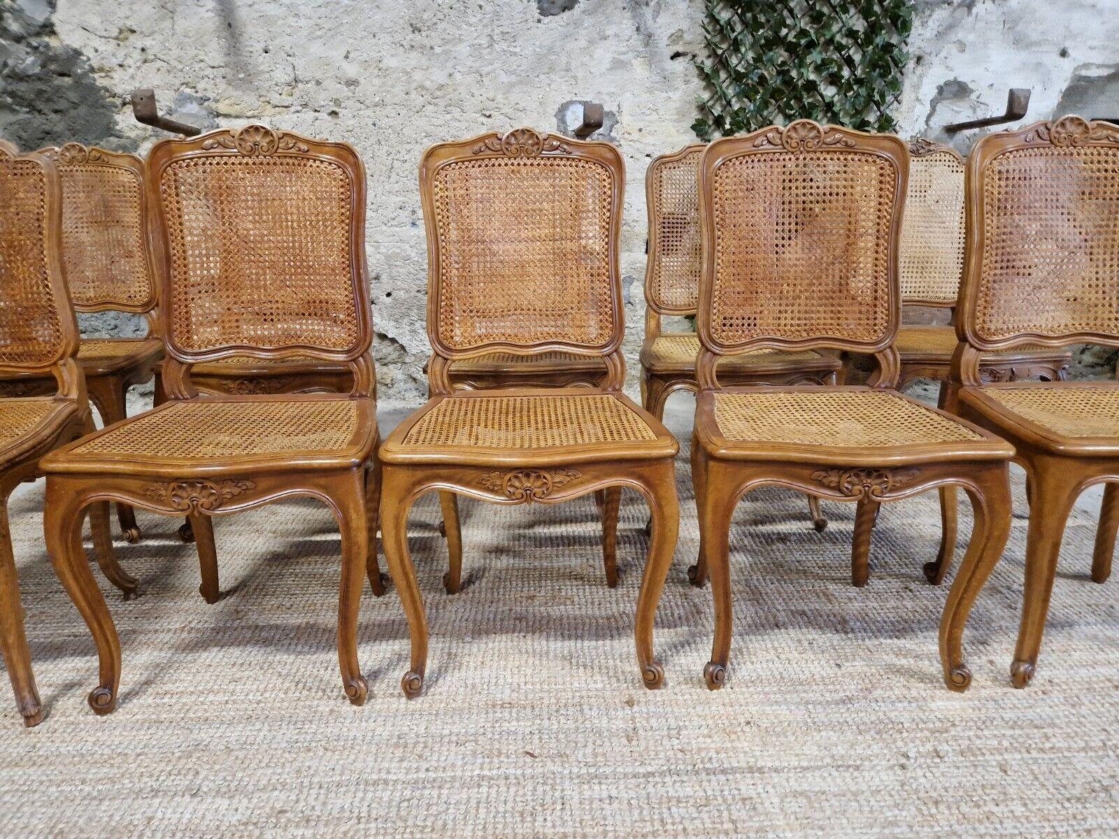 ROCAILLE ANTIQUES

This is a suite of 10 antique French cane dining chairs from the early 20th in the Louis xv style. The chairs are made of high-quality walnut wood and feature a beautiful Rocaille design. Each chair is fully assembled and has a