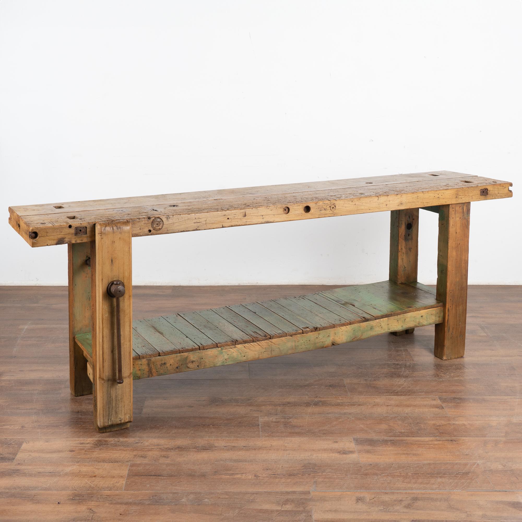 The years of constant use are revealed in every ding, deep gouge, stain, and scratch has enriched the character of this impressive carpenters' workbench from France.
Please examine the close up photos to appreciate the deep patina, joints and old
