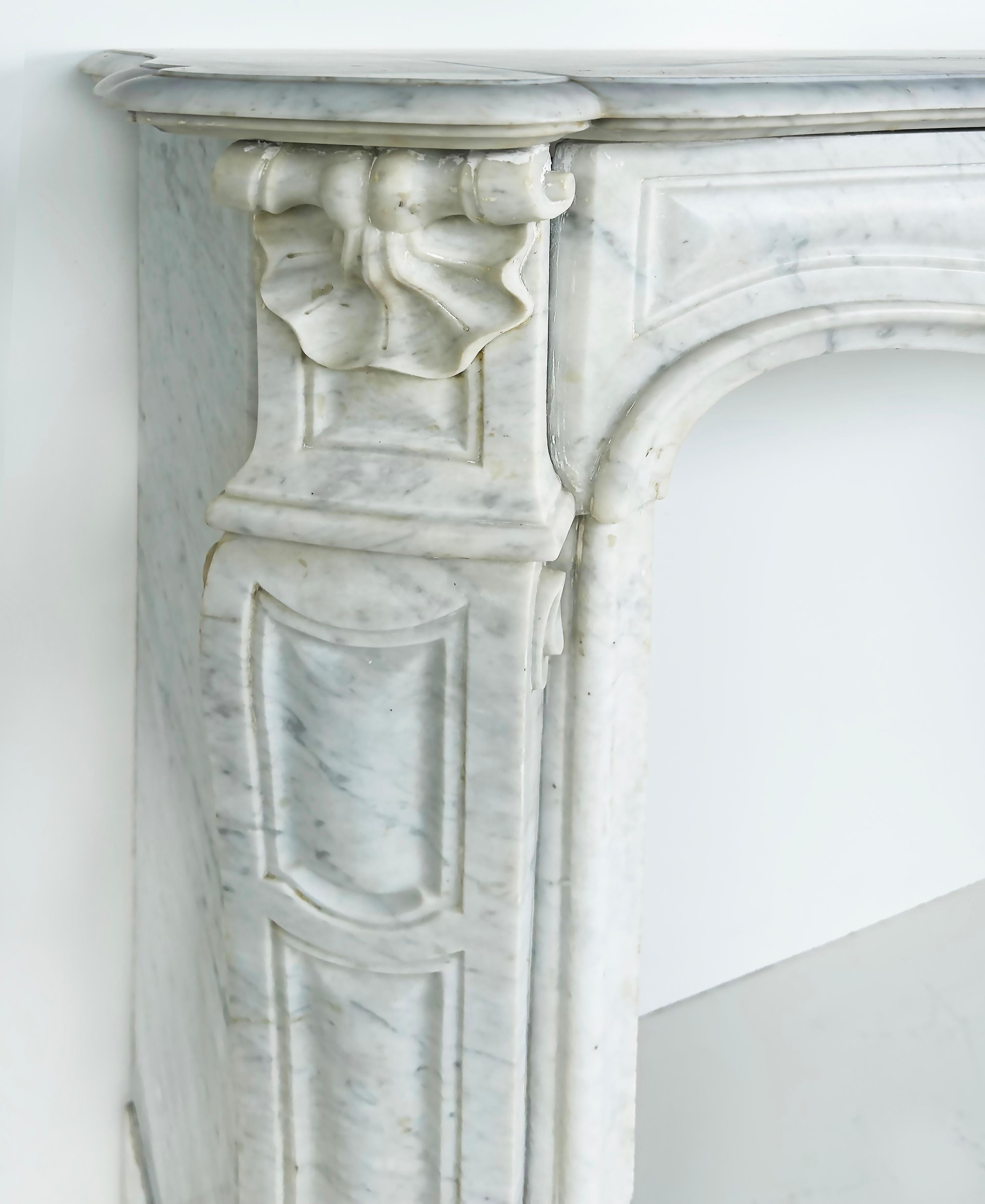 Early 20th Century Antique French Carrara Marble Louis XV Style Fireplace Mantel  For Sale