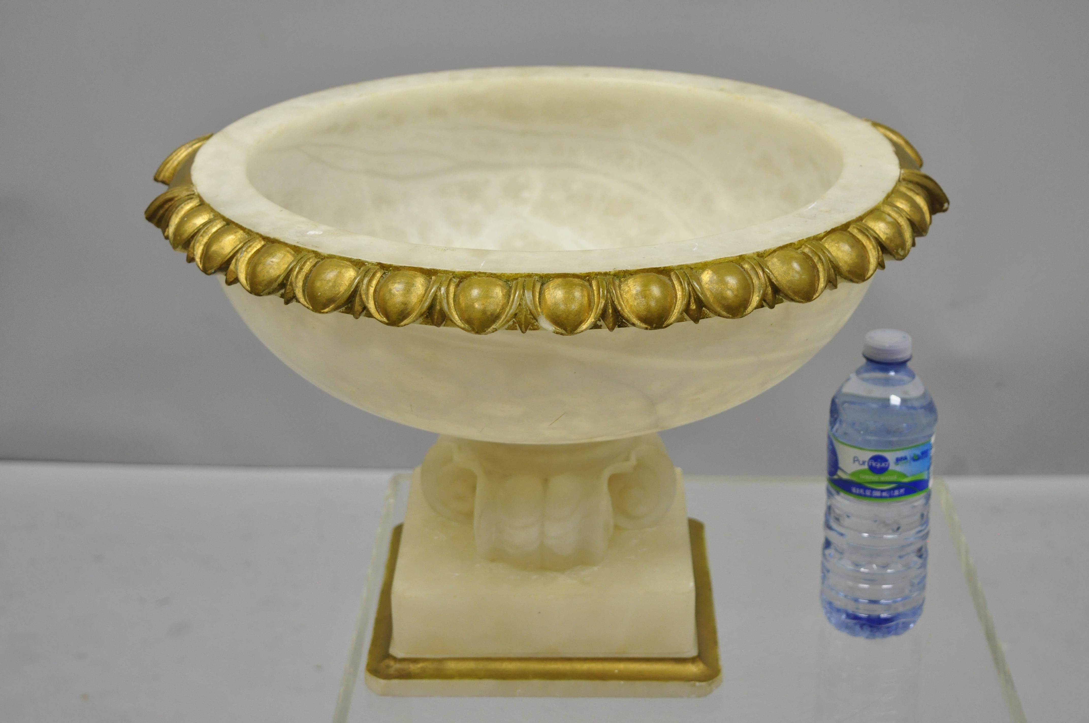 Antique French carved alabaster large table centerpiece fruit bowl. Item features large impressive carved alabaster form, gold painted accents, pedestal base, very nice antique item, weighs approximately 30lbs, circa early to mid-20th century.