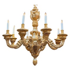 Antiguo candelabro francés tallado y dorado de 8 brazos