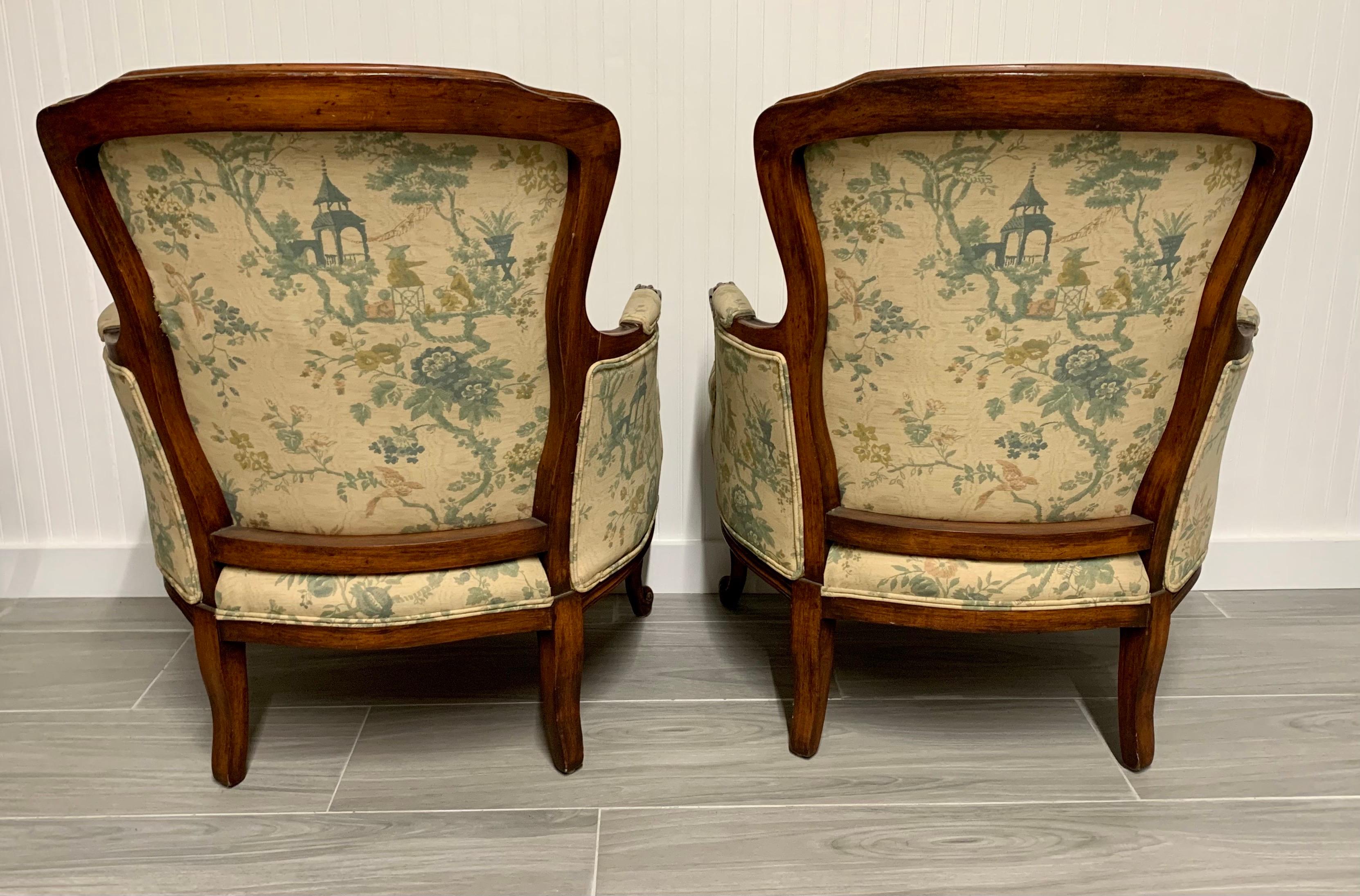 Antique French Carved Bergeres Arm Chairs with Chinoiserie Upholstery In Good Condition In West Hartford, CT