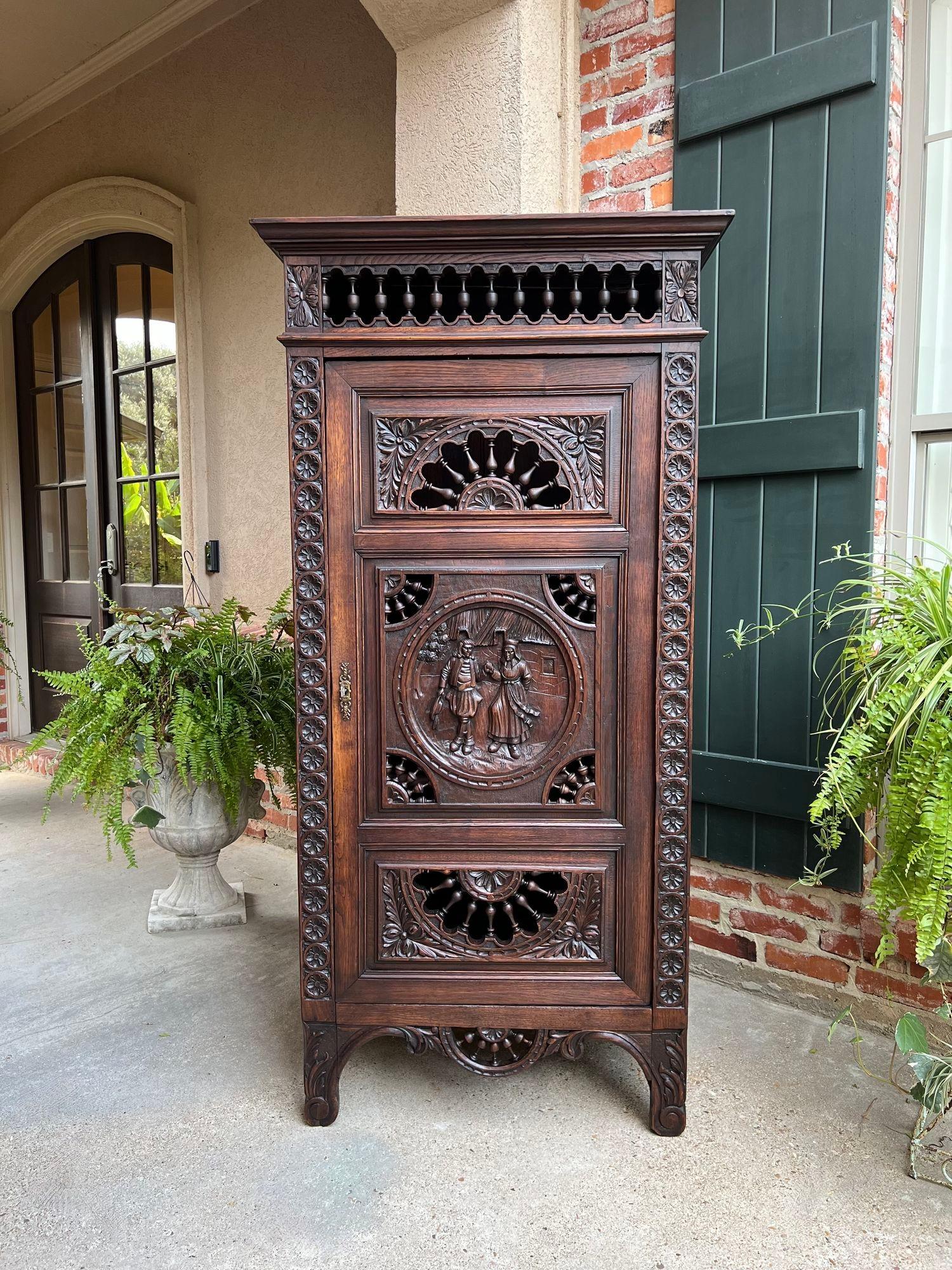 Antique French Carved Bonnetiere Armoire Cabinet Brittany Breton Ship Spindle.

Direct from France, a lovely antique French armoire or “bonnetiere” cabinet, with gorgeous hand carvings throughout.  The slender, smaller size makes a “bonnetiere”