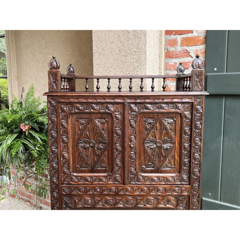Hand-Carved Antique French Carved Chestnut Cabinet Bonnetiere Armoire Breton Brittany For Sale