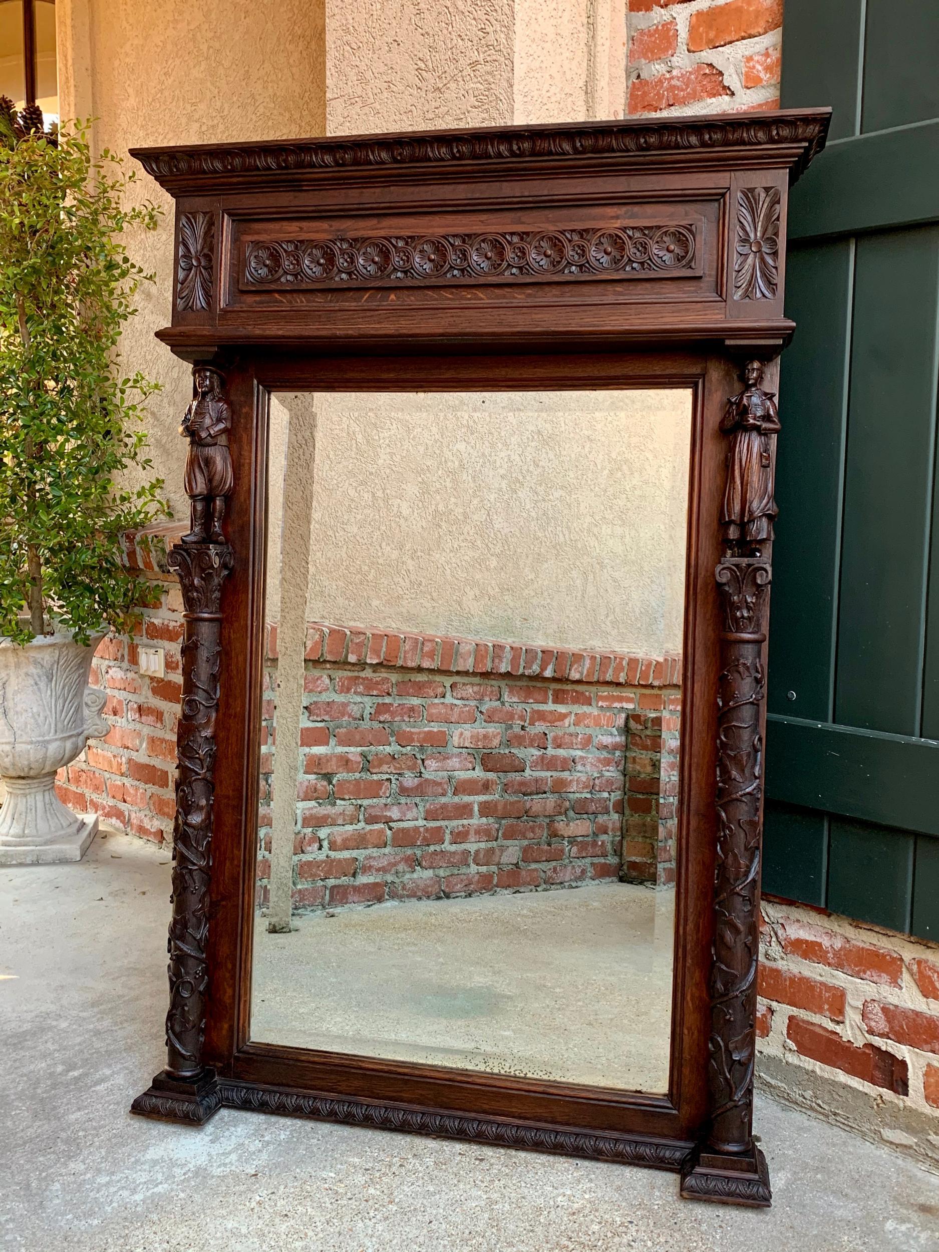 Antique French carved chestnut pier mantel mirror Breton Brittany frame beveled

~ Direct from France
~ A large and lovely antique French wall mirror, in full pier mirror size
~ Beautiful hand carved designs and distinctive Breton style
~ Large