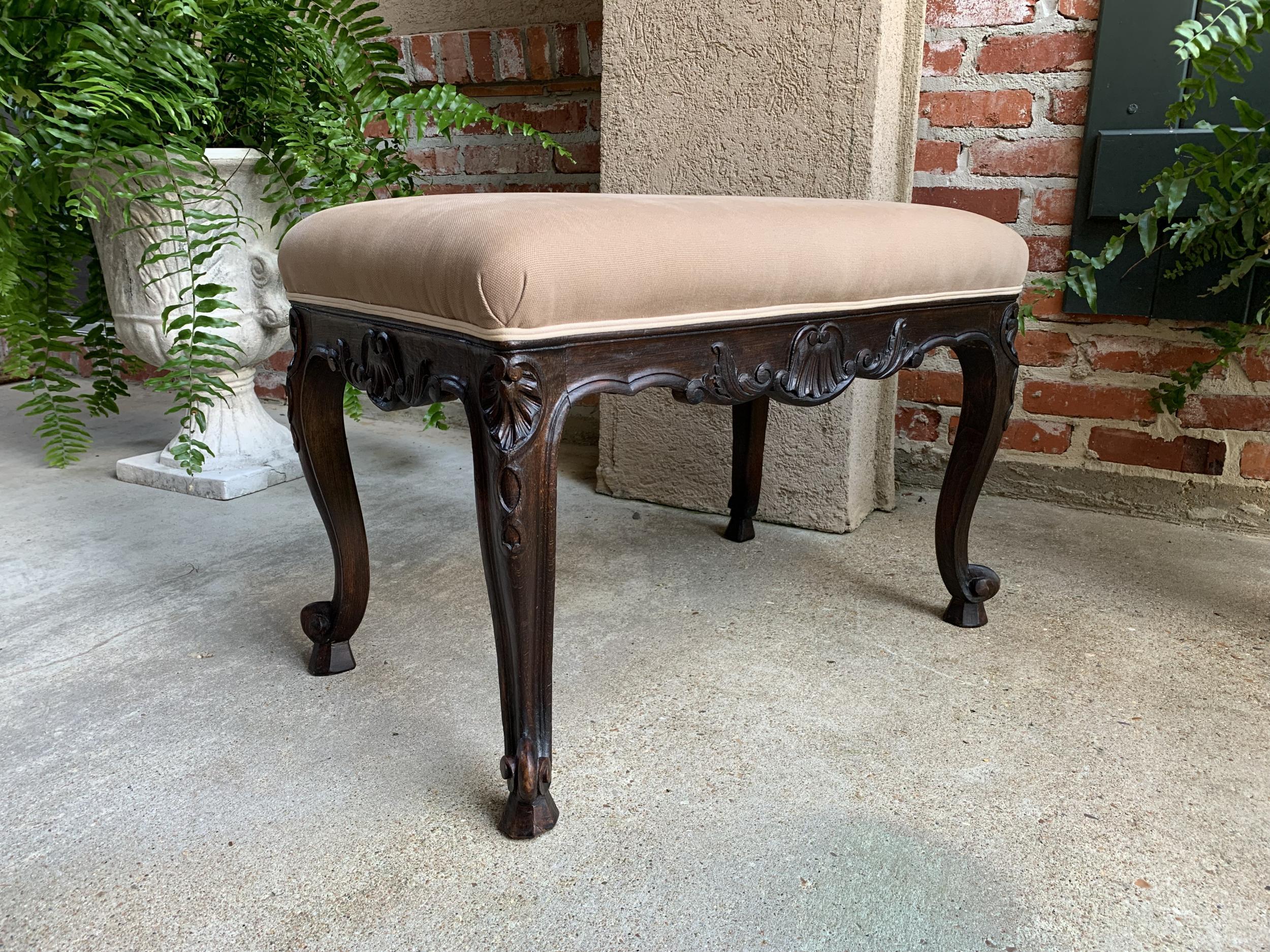 Antique French Carved Dark Oak Bench Stool or Ottoman Louis XV style.

~Direct from France~
~One of several great antique stools, tabourets, and benches from our most recent container, these benches are so versatile in today's home!~
~Fabulous