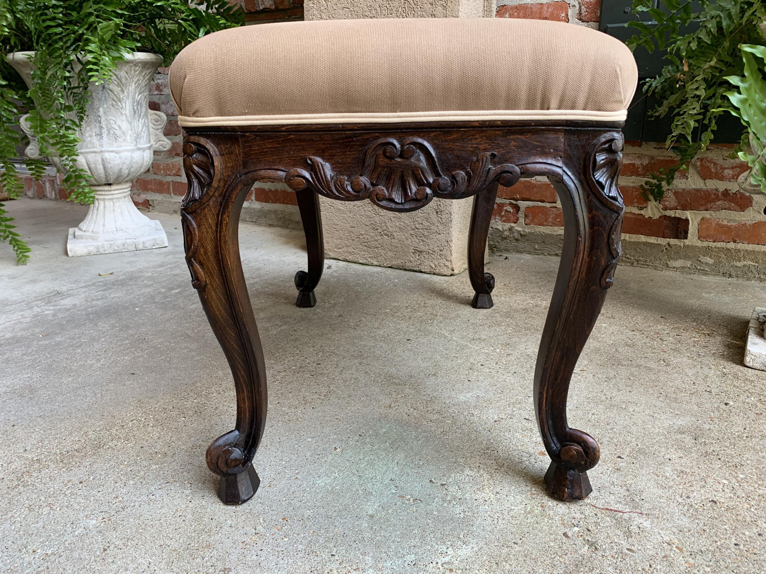 Early 20th Century Antique French Carved Dark Oak Bench Stool Ottoman Louis XV style For Sale