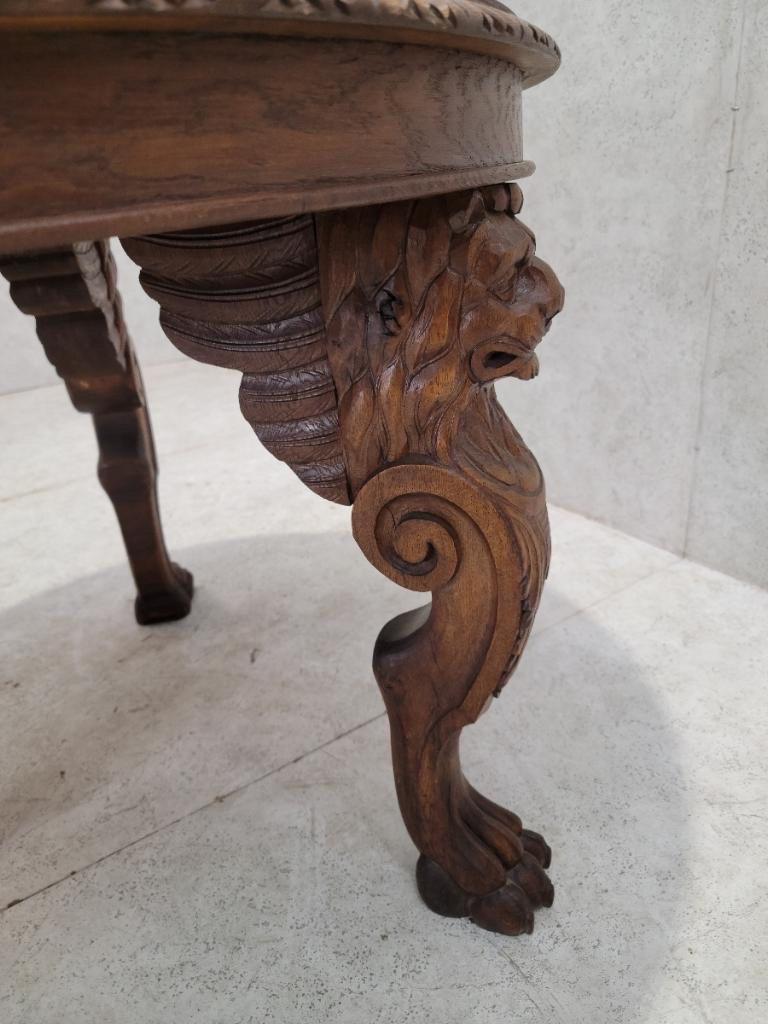 Antique French Carved Figural Oak Entry Table

An antique French finely carved oak table with 3 winged lions-head legs with pawed feet.

Circa Early 20th Century 

Dimensions:
H 28