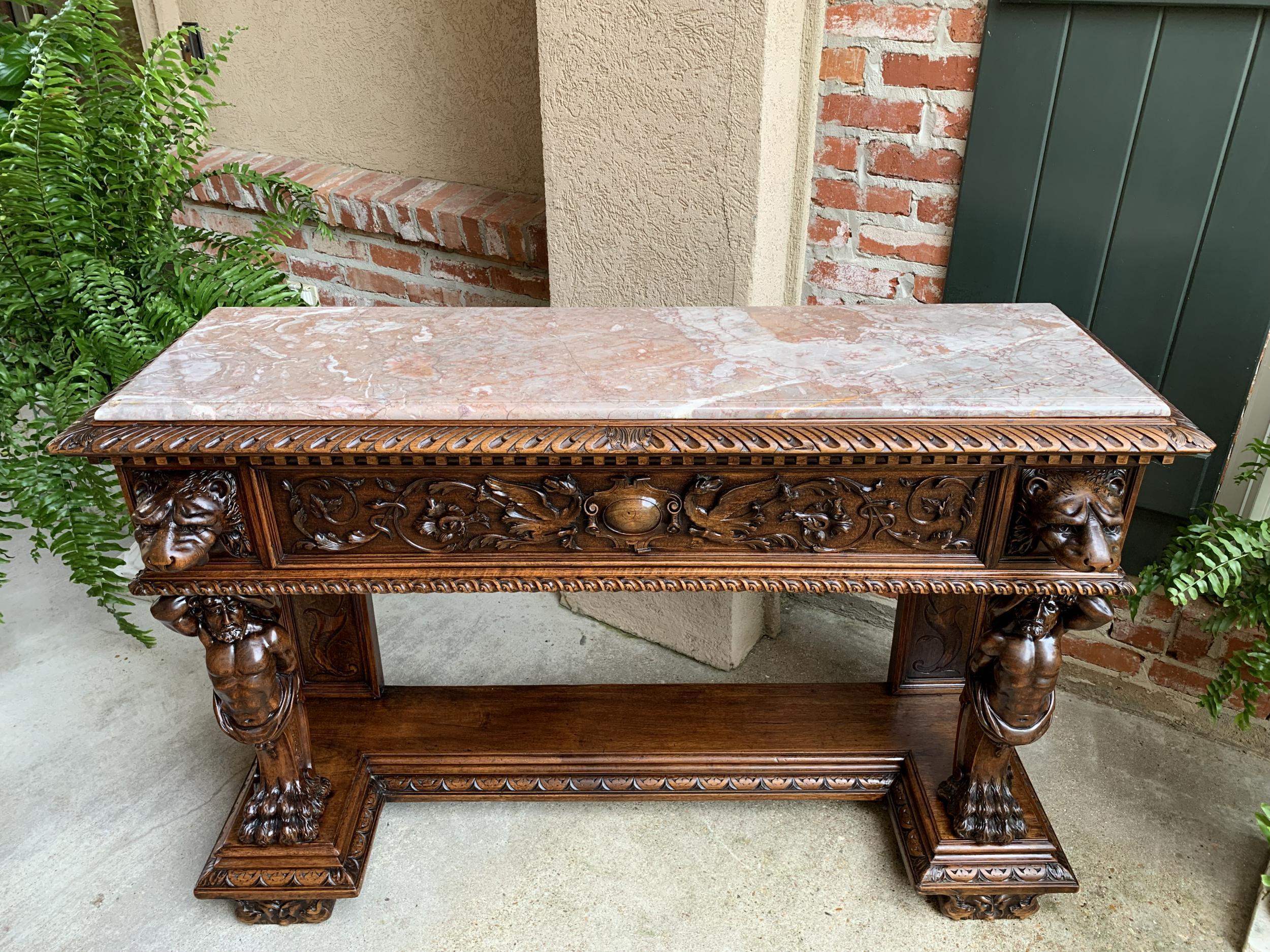 Antique French carved foyer sofa table Renaissance marble planter Hercules lion

~Direct from France~
~Gorgeous, heavily carved antique foyer or sofa table having meticulously carved details and a thick, beveled edge marble top~
~Large,