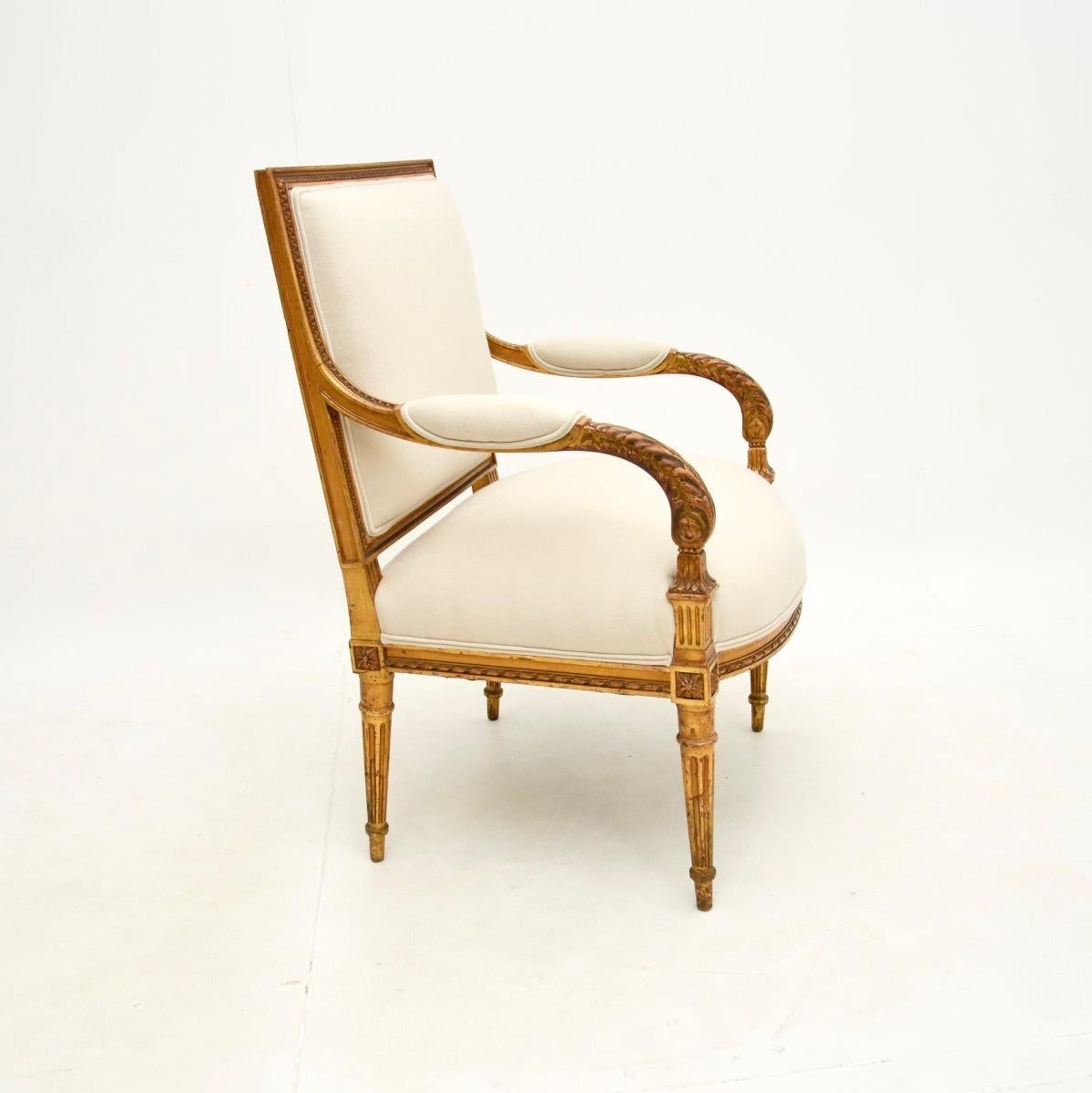 Louis XIV Antique French Carved Gilt Wood Armchair For Sale