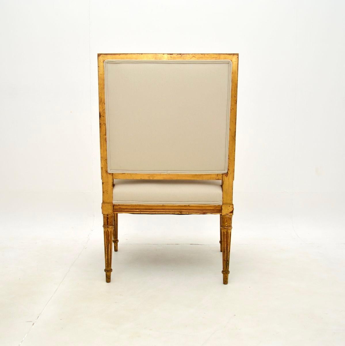 Fabric Antique French Carved Gilt Wood Armchair For Sale