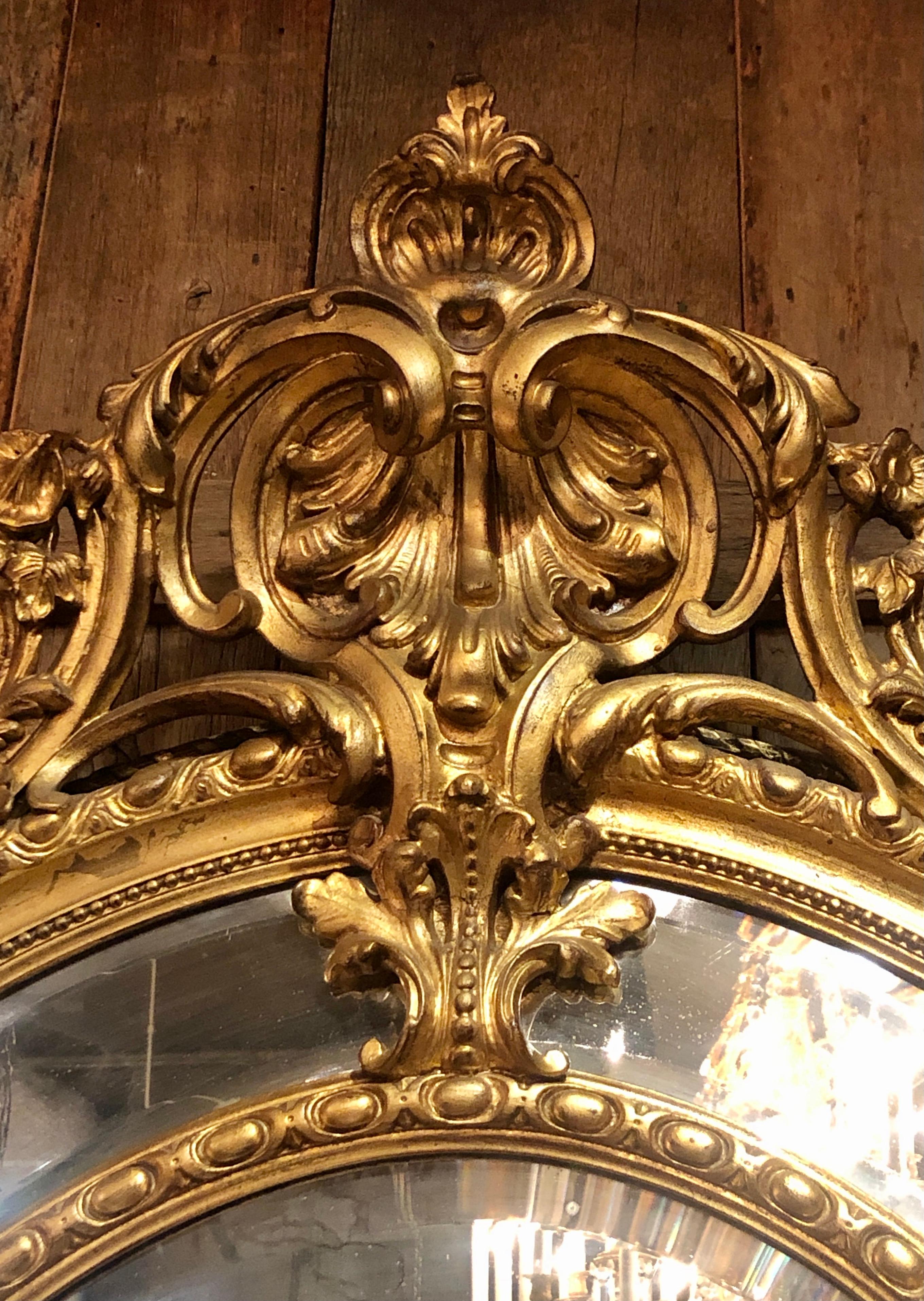 19th Century Antique French Carved Gilt Wood Oval Mirror with Beveling, circa 1870-1890