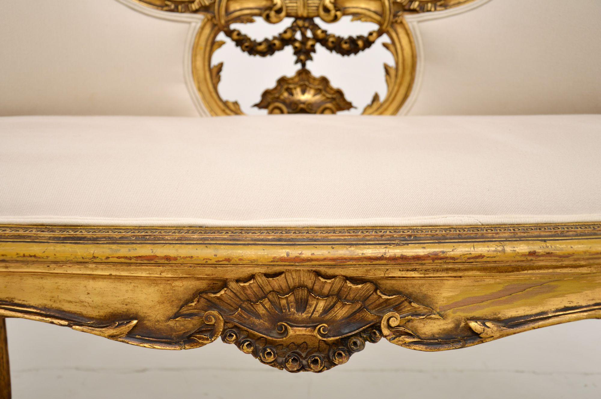 Late 19th Century Antique French Carved Giltwood Settee For Sale