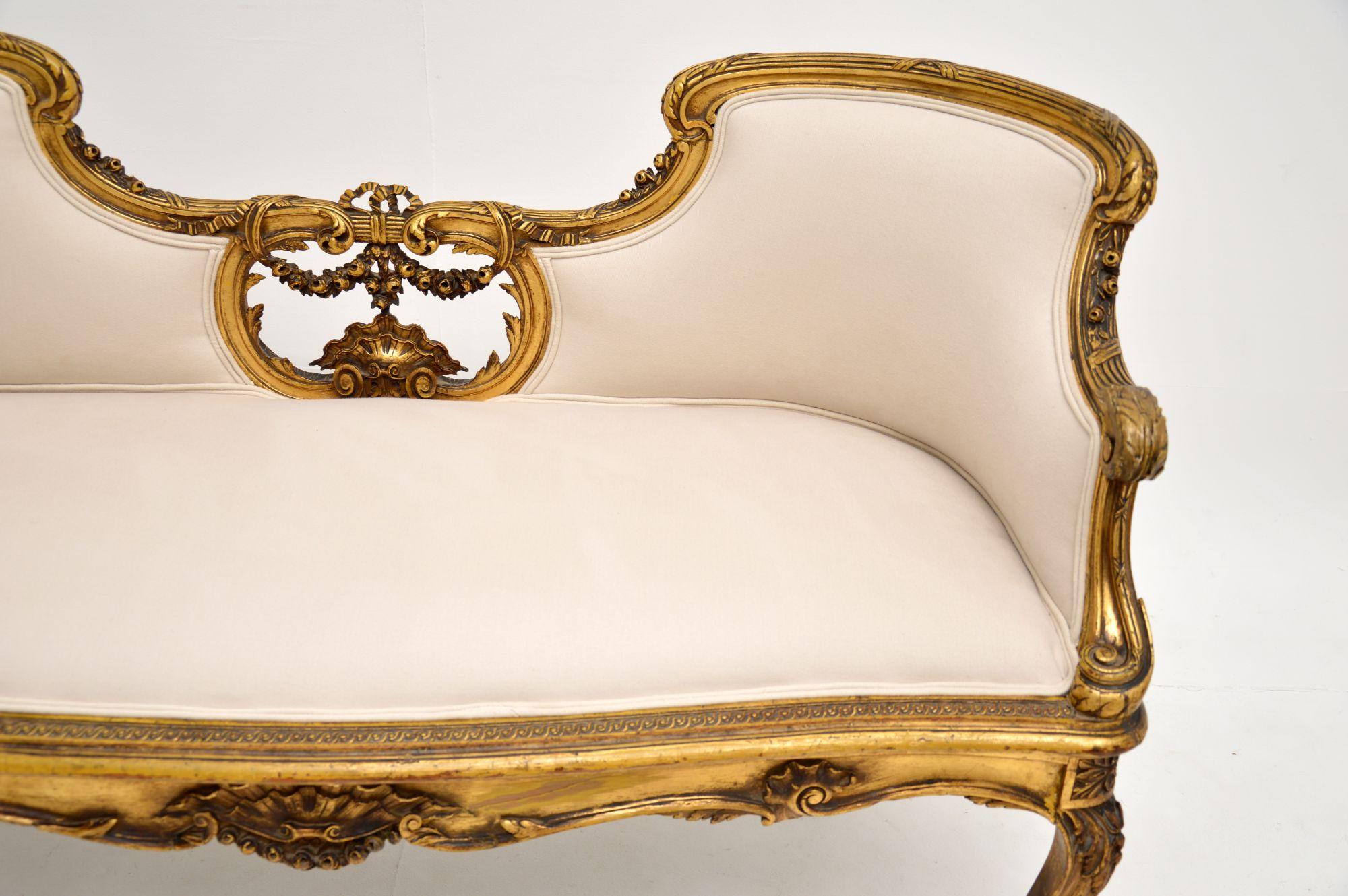 Fabric Antique French Carved Giltwood Settee For Sale