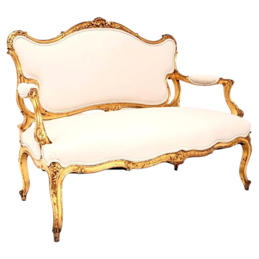 Antique French Carved Gilt Wood Settee For Sale