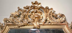 Antique French Carved Giltwood Mirror with Beveling, Circa 1860.