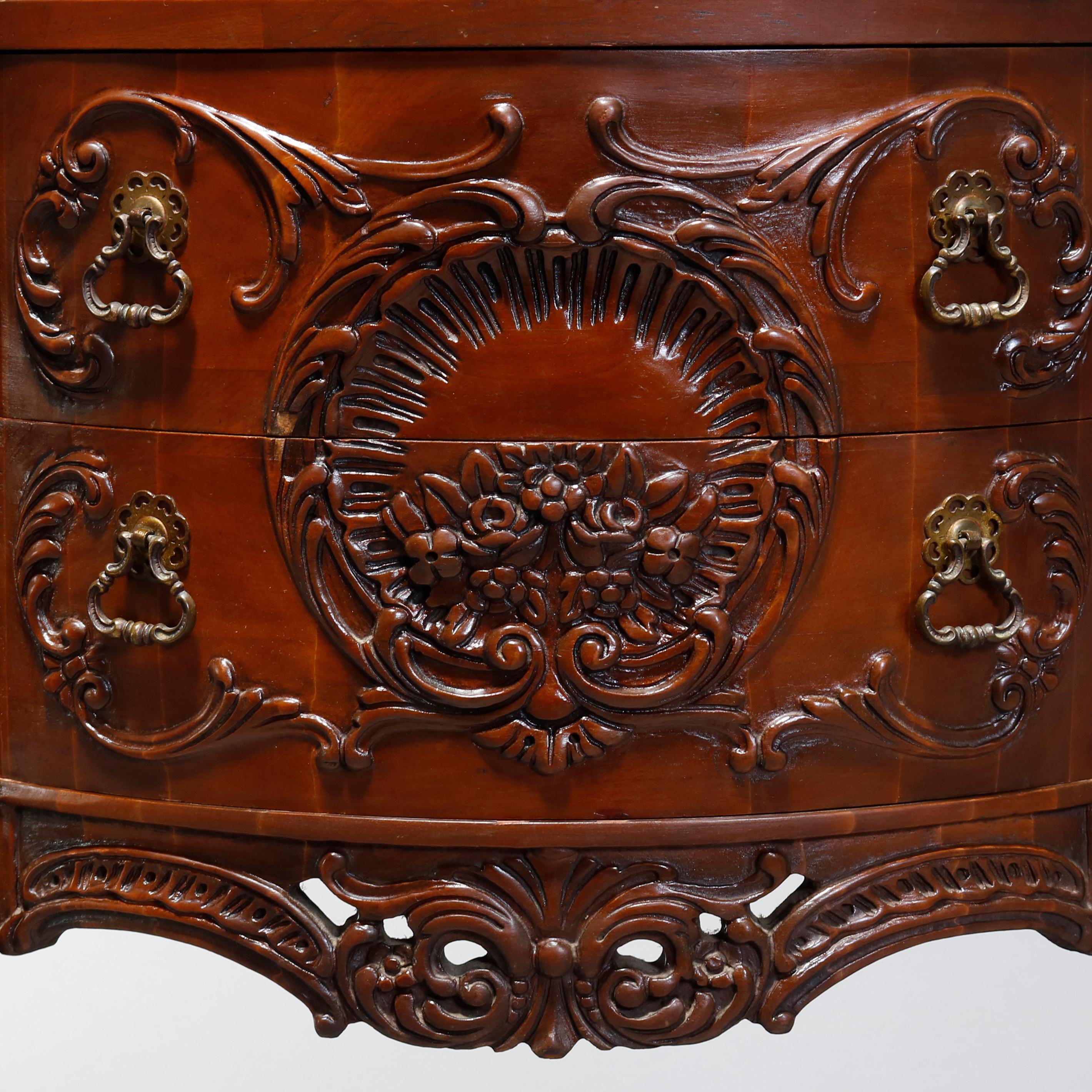 An antique French Louis XV commode offers marble top surmounting mahogany demilune case having three drawers, foliate and scroll carving over pierced skirt, raised on cabriole legs with acanthus carved knees and scroll form feet, 20th