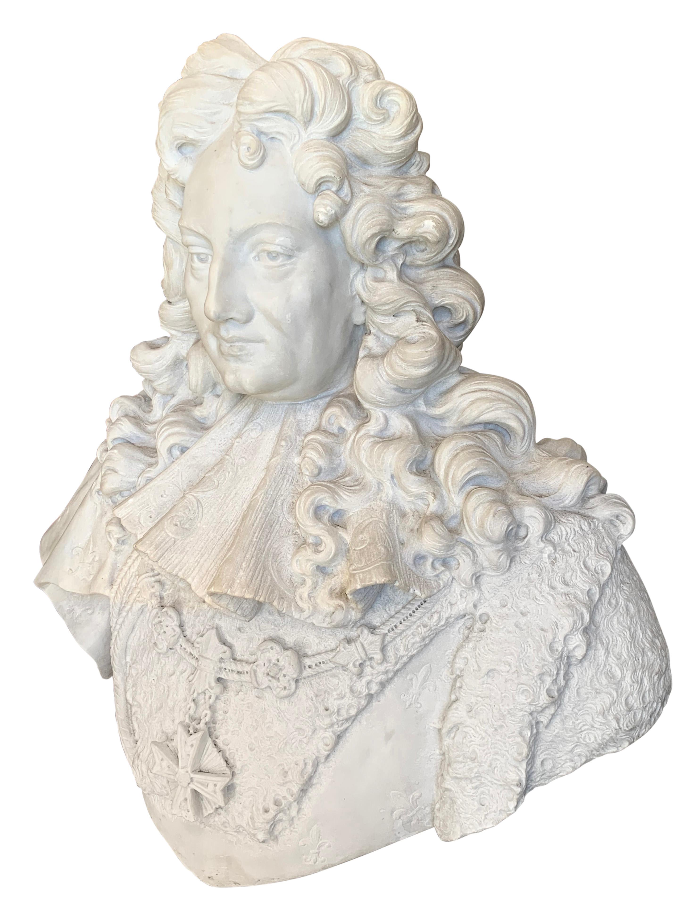 A French Antique Carved Marble Bust of Louis XIV, a masterful embodiment of artistry and historical grandeur. Crafted with precision and reverence, this carved marble bust captures the essence of the iconic French monarch, Louis XIV, in a timeless